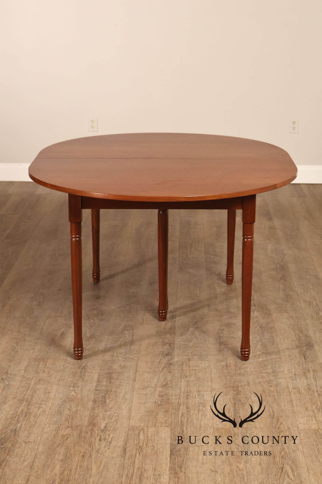 E. A. Clore Custom Walnut Extendable Dining Table With Four Leaves