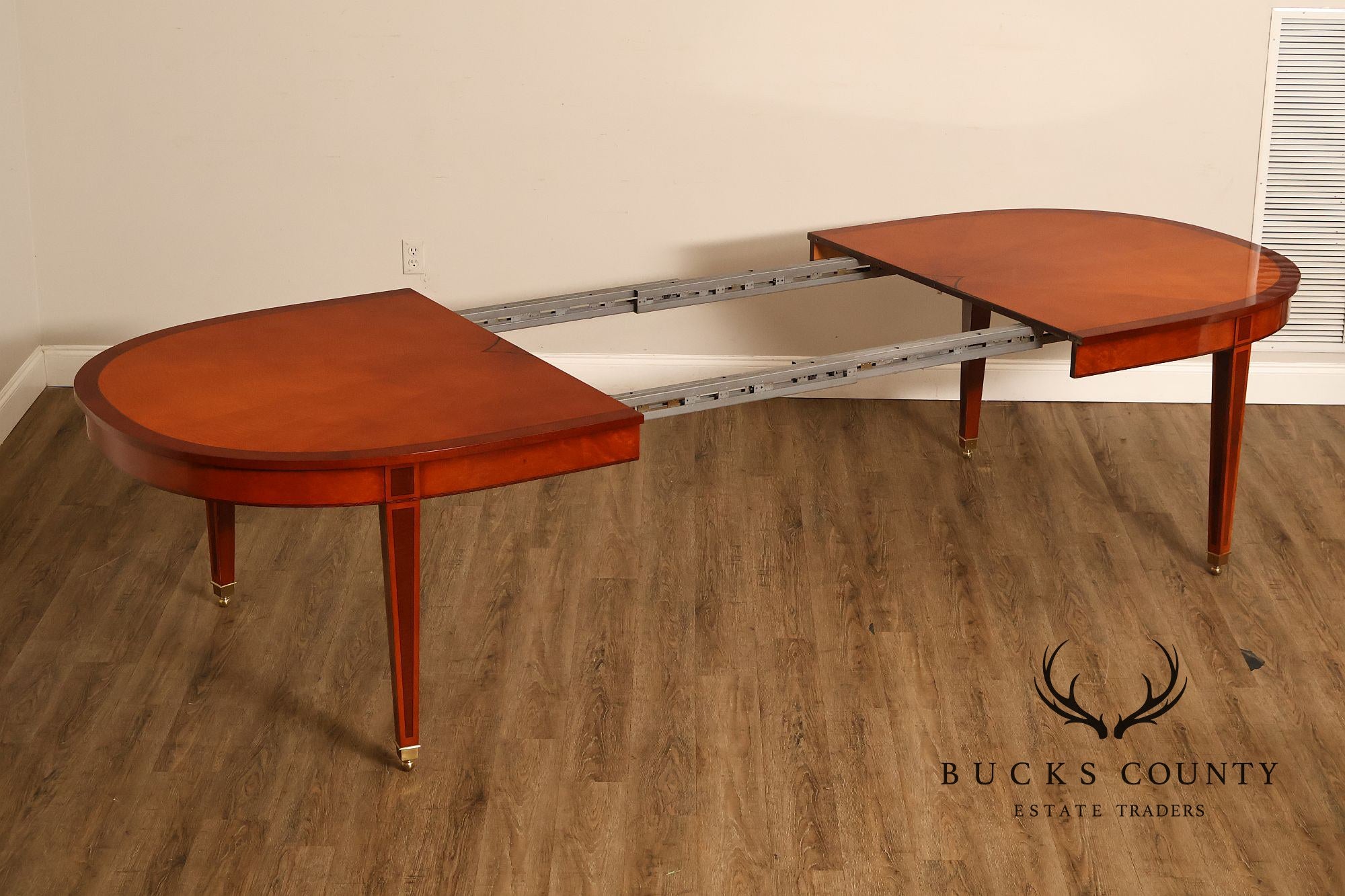 Kindel Kent Mahogany Banded Oval Dining Table with Three Leaves