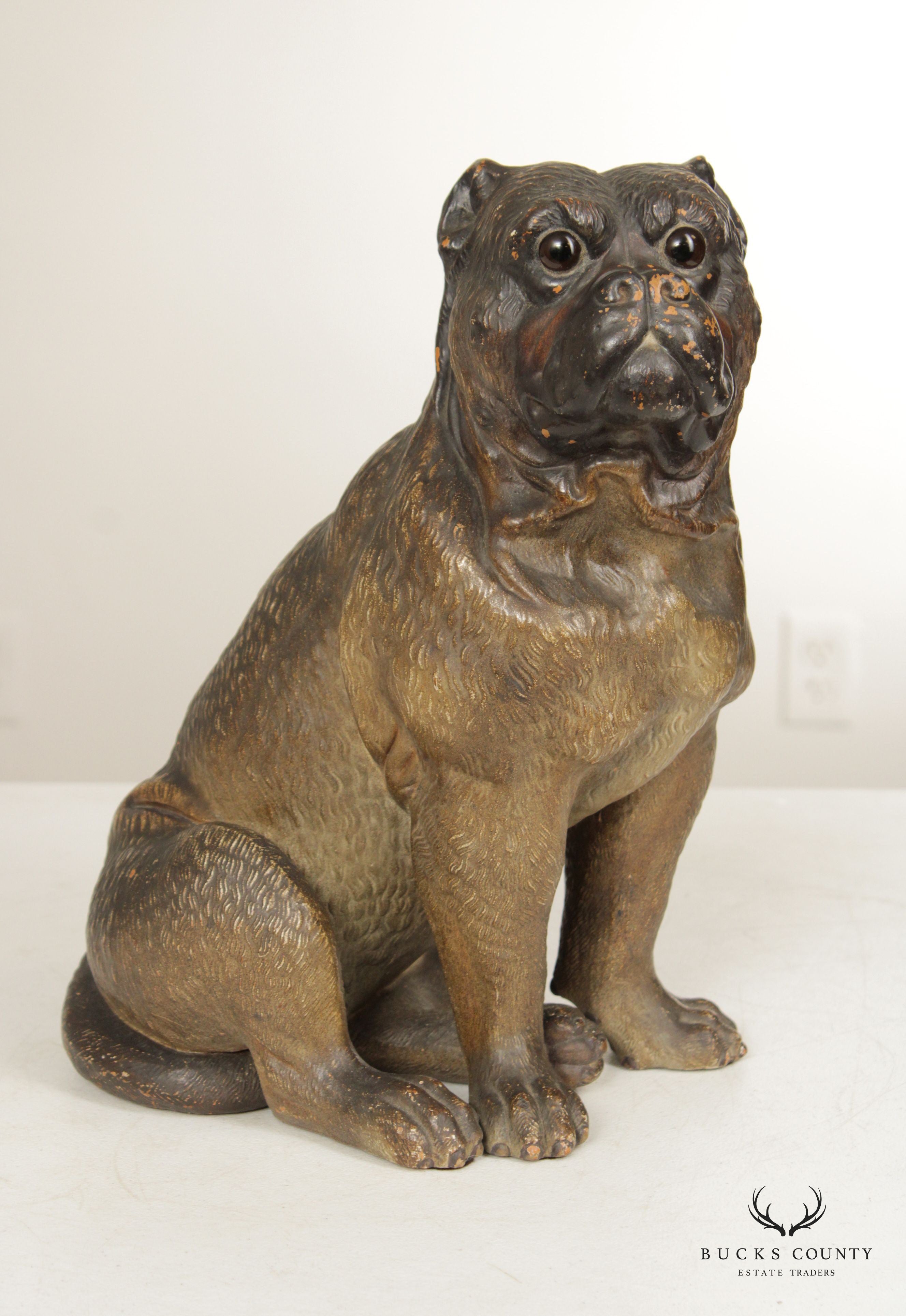 TERRA COTTA SITTING PUG DOG STATUE ATTRIBUTED TO GOLDSCHEIDER