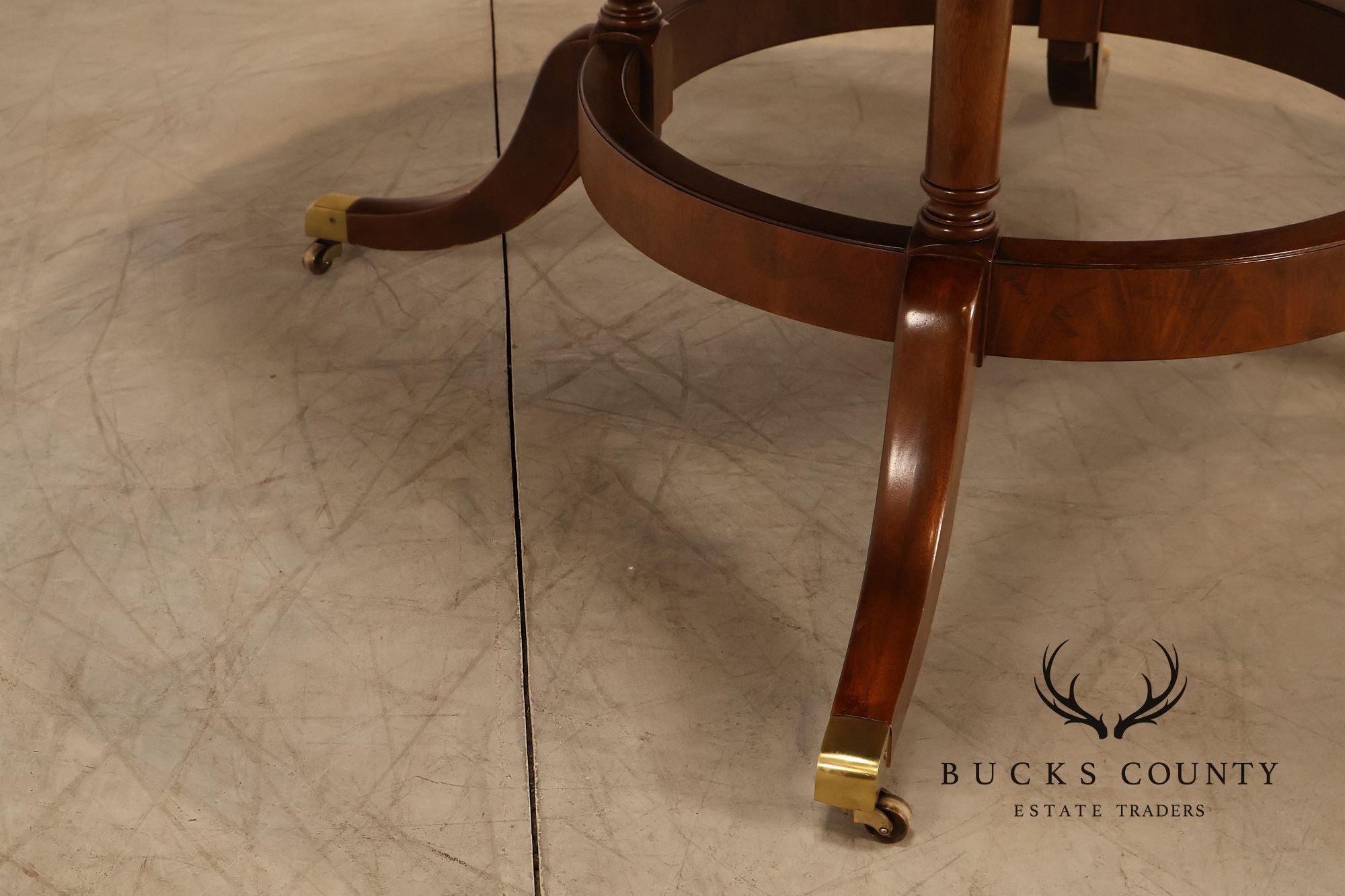E.J. Victor Regency Style Round Inlaid Mahogany Pedestal Dining Table