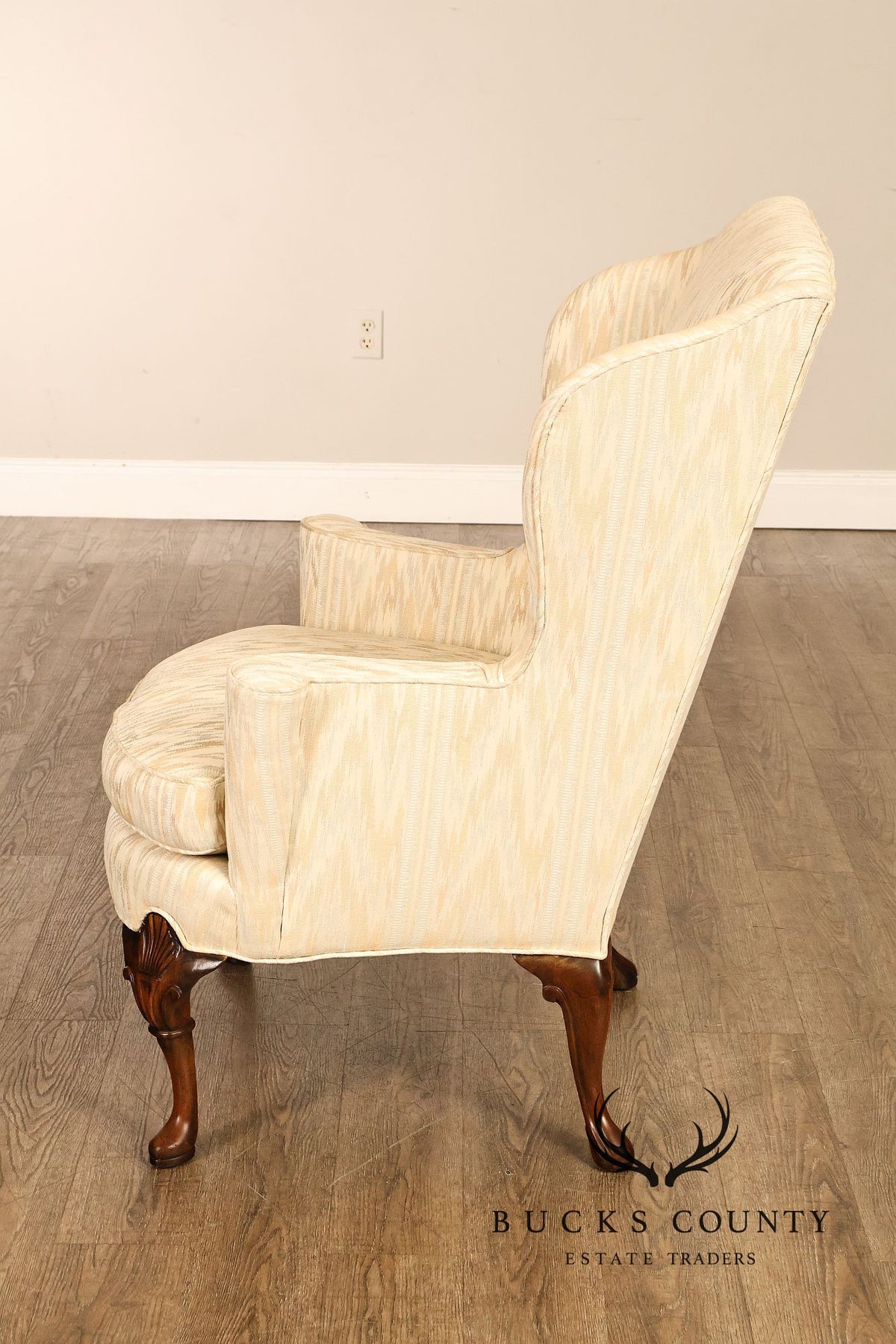 Traditional Upholstered Pair Of Wingback Armchairs With Carved Cabriole Legs