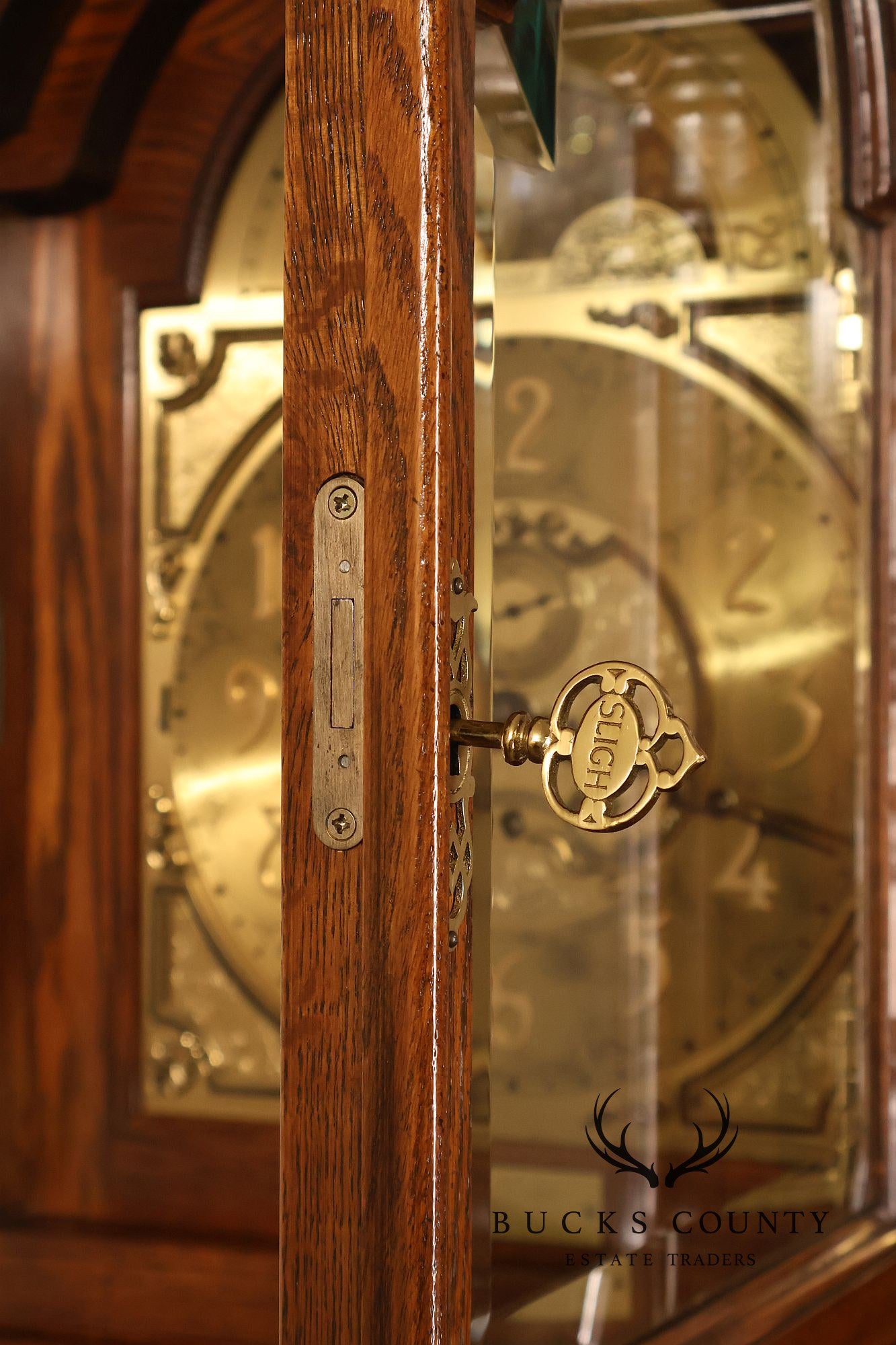 Sligh Traditional Oak Triple Chime Grandfather Clock With Moon Phase Dial