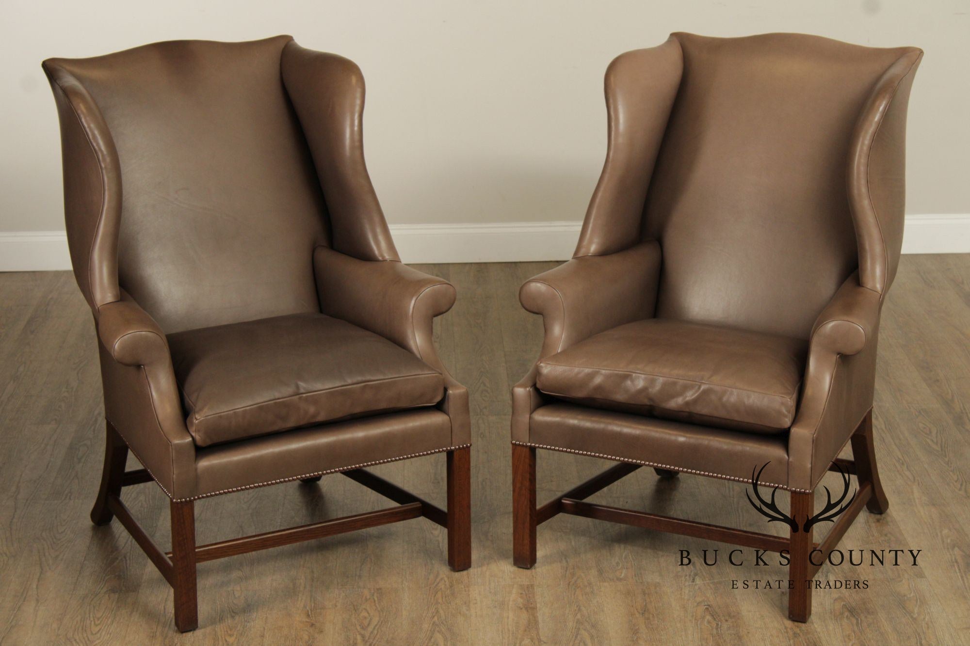 Chippendale Style Pair of Leather Wing Chairs