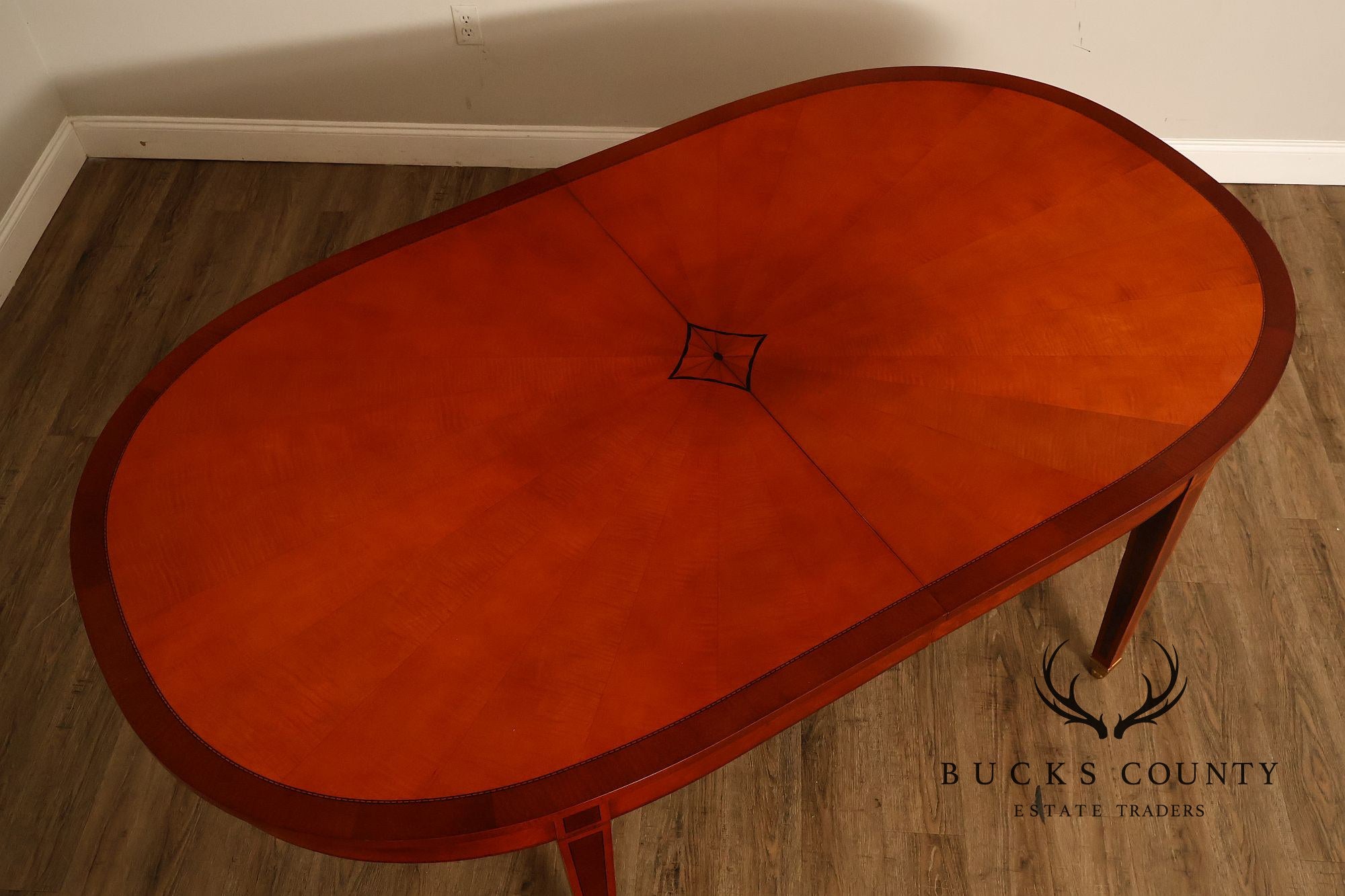 Kindel Kent Mahogany Banded Oval Dining Table with Three Leaves