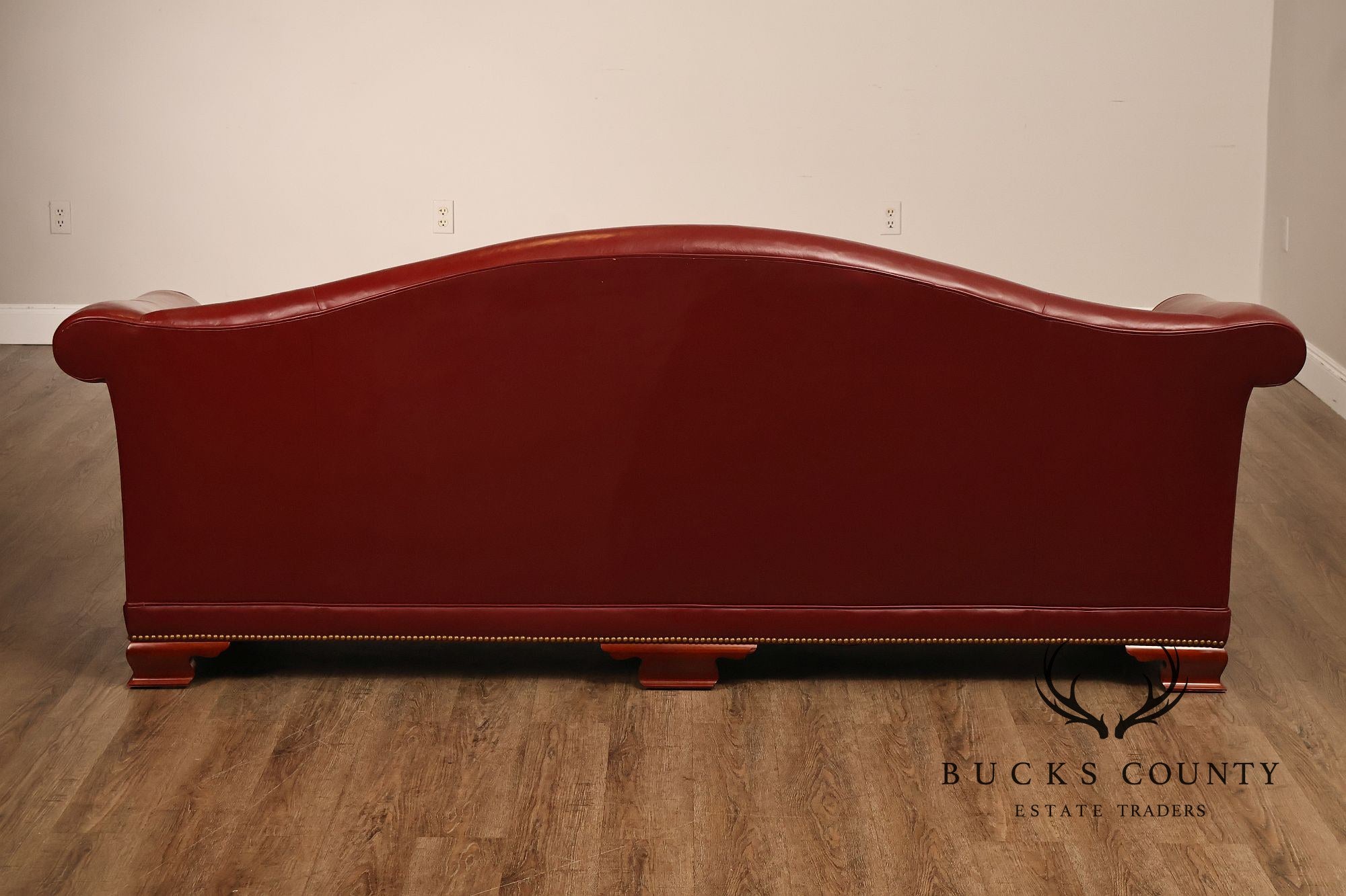 Kindel Vintage Camelback Back Leather Three Cushion Sofa