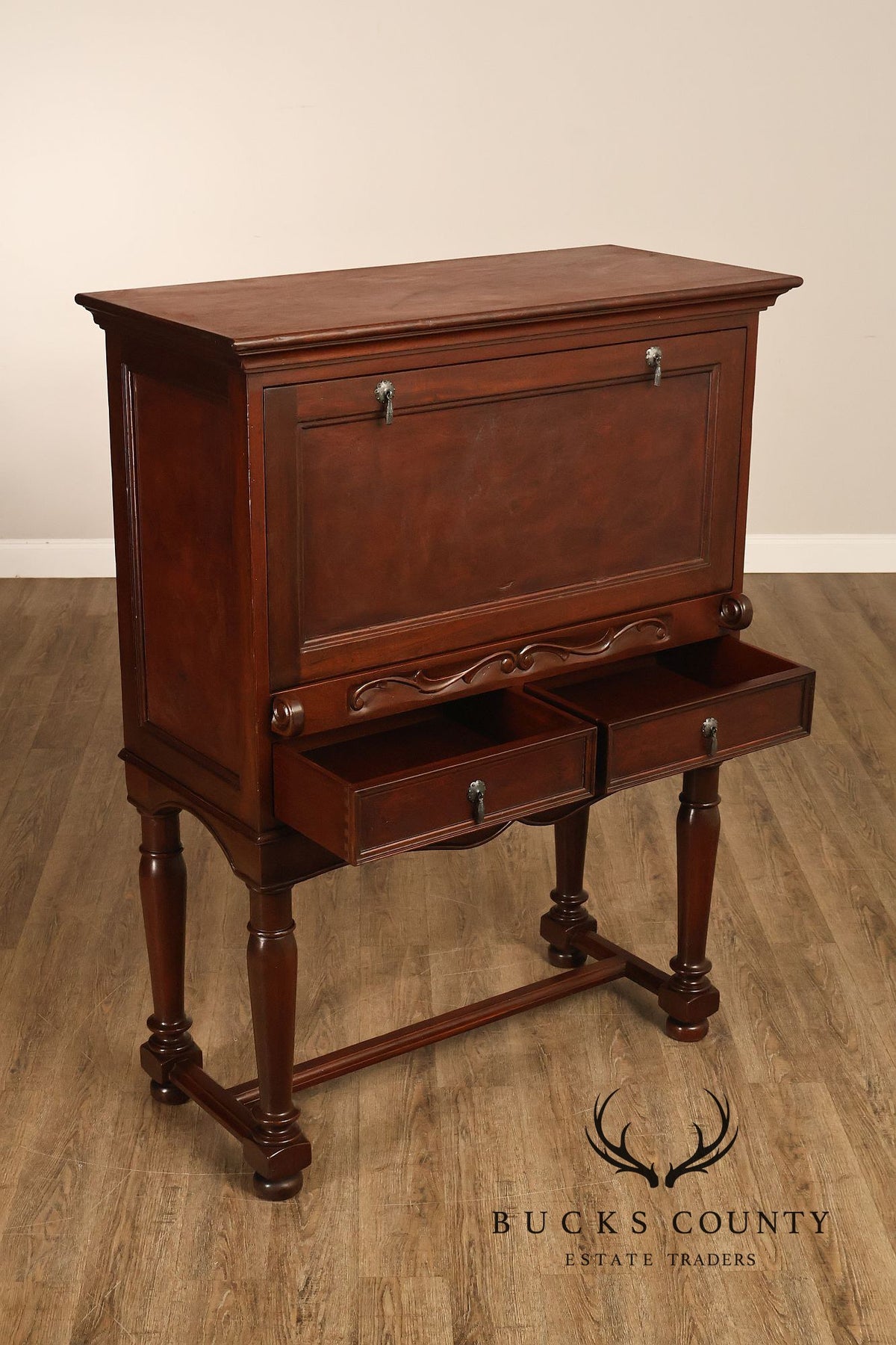 Traditional English Style Drop Front Bar Cabinet With A Stretcher Base