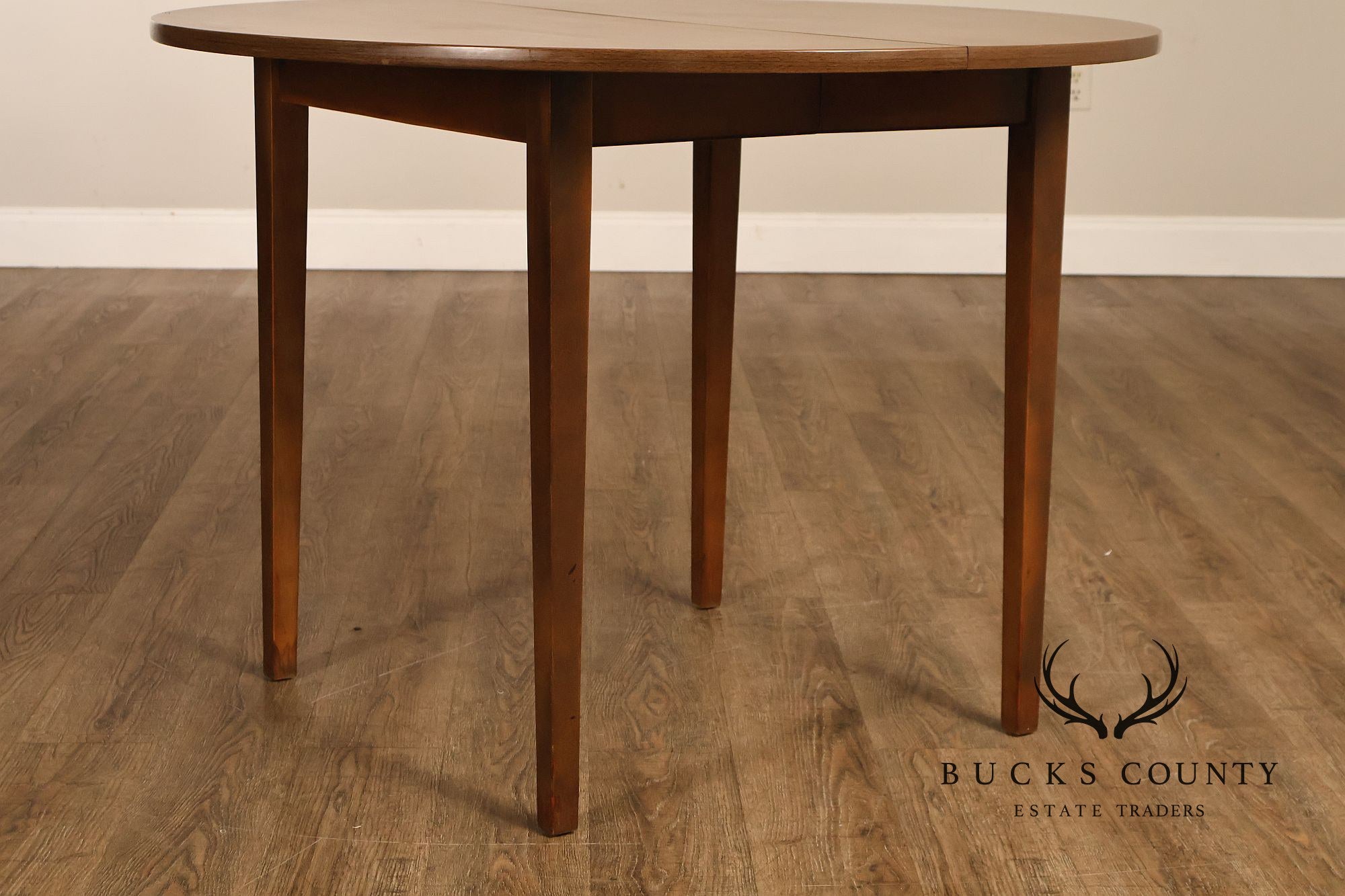 Mid Century Modern Round Expandable Dining Table