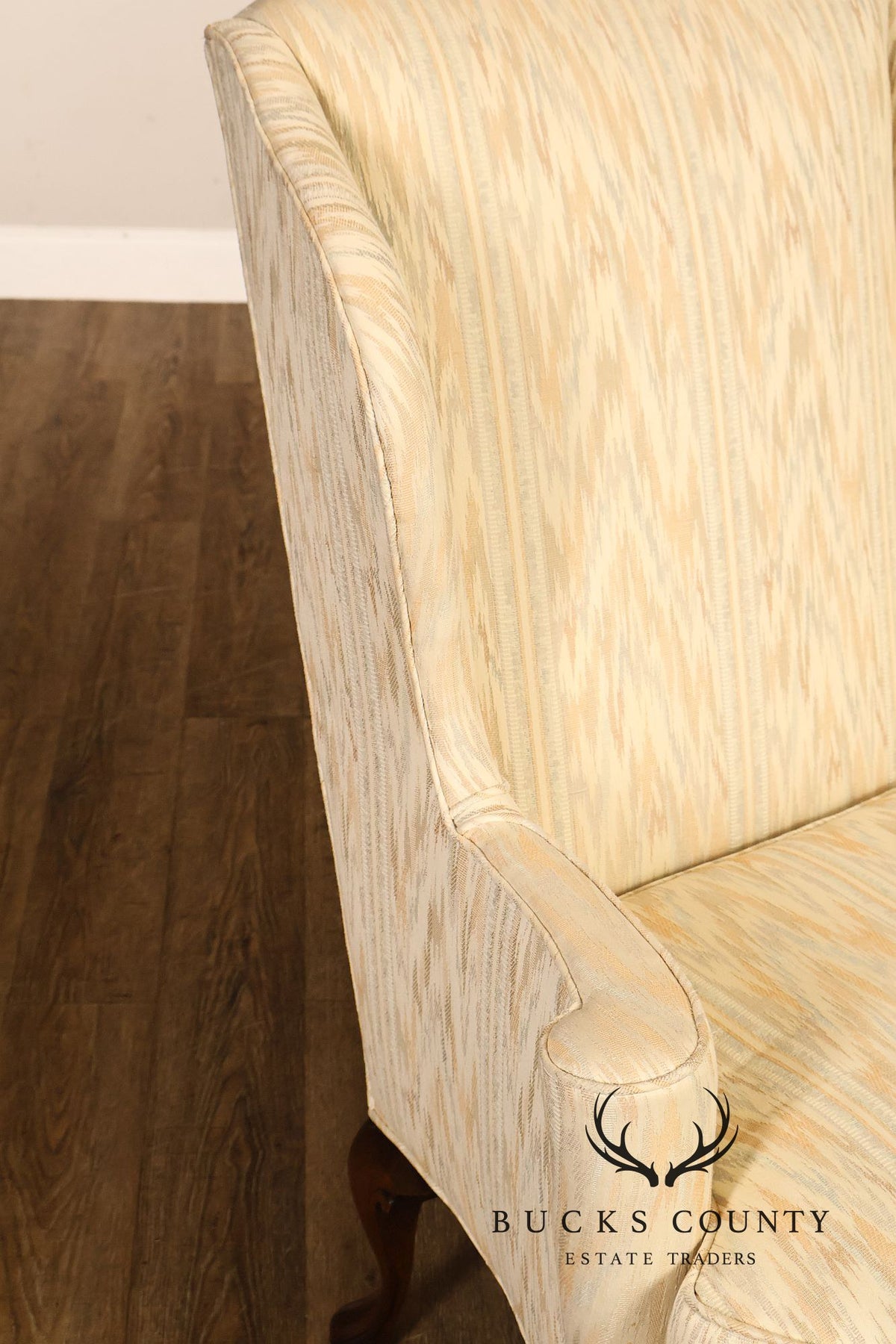 Traditional Upholstered Pair Of Wingback Armchairs With Carved Cabriole Legs