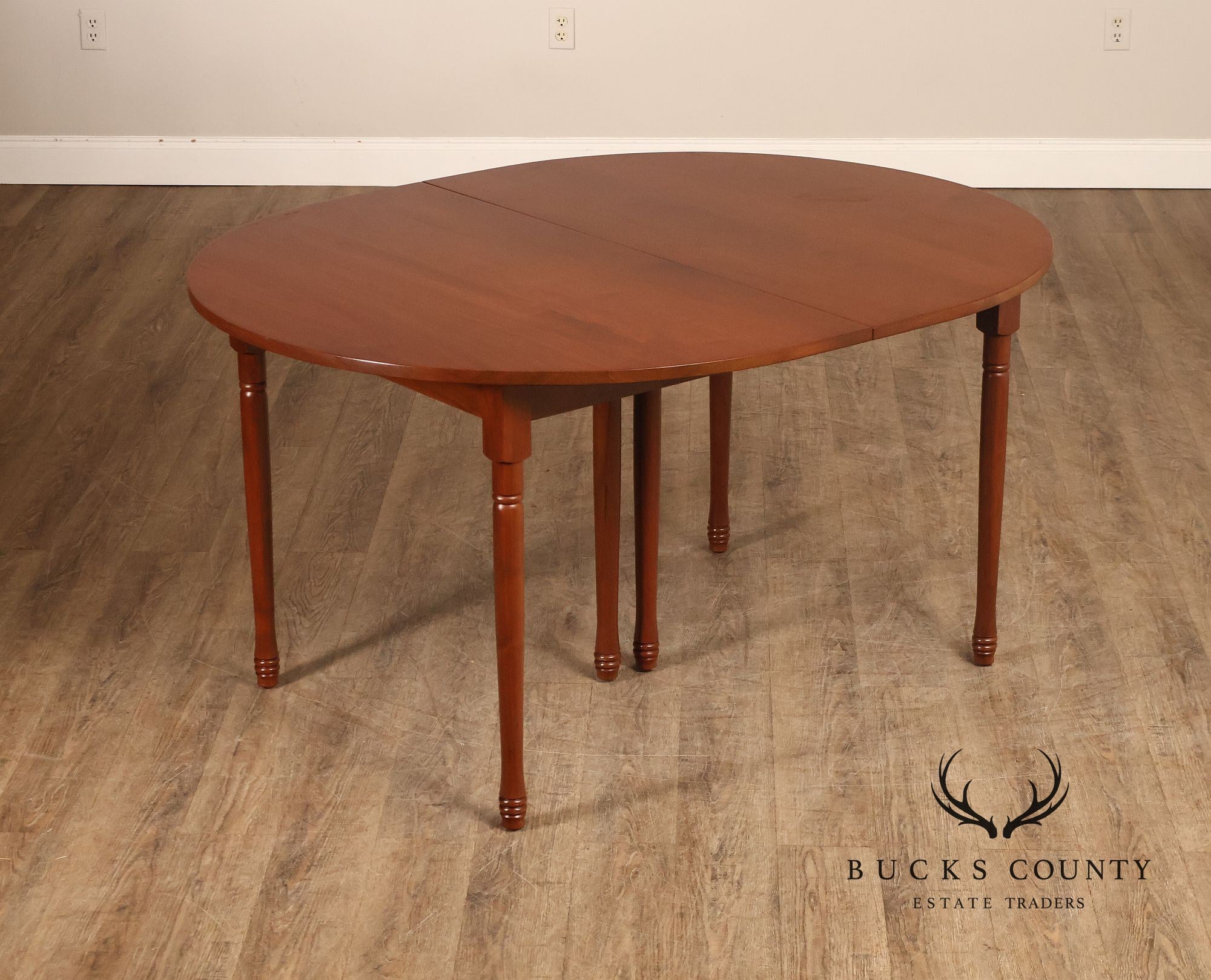 E. A. Clore Custom Walnut Extendable Dining Table With Four Leaves