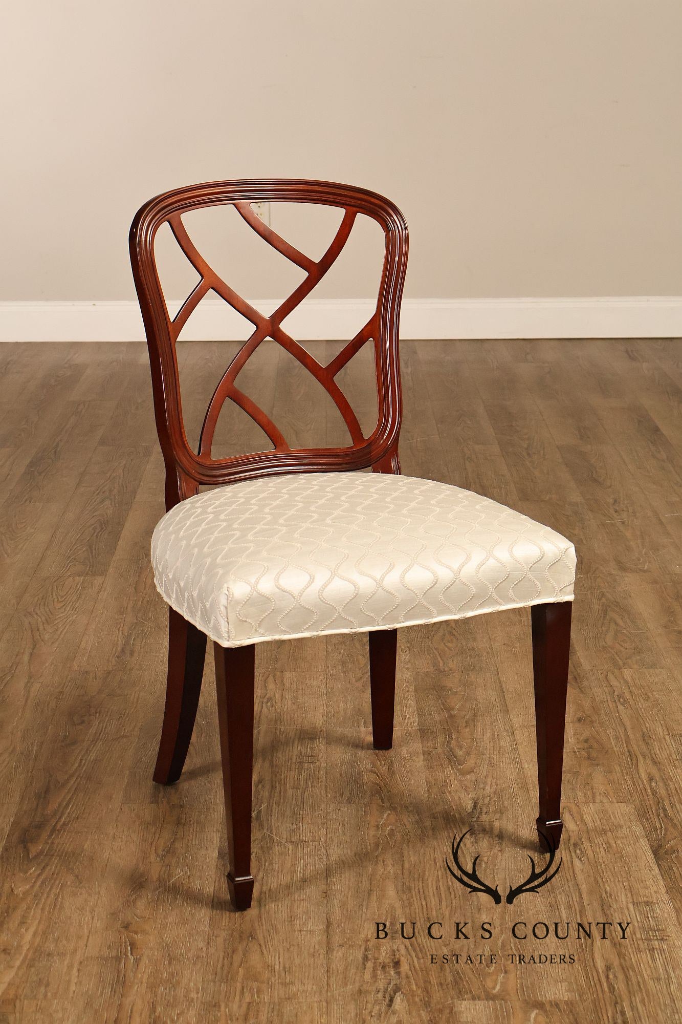 Kindel Set of Four Mahogany 'Hepplewhite' Dining Chairs