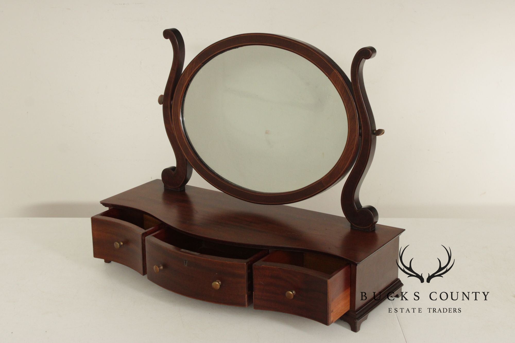 Potthast Bros. Federal Style Mahogany Shaving Mirror With Serpentine Base And Oval Swivel Glass
