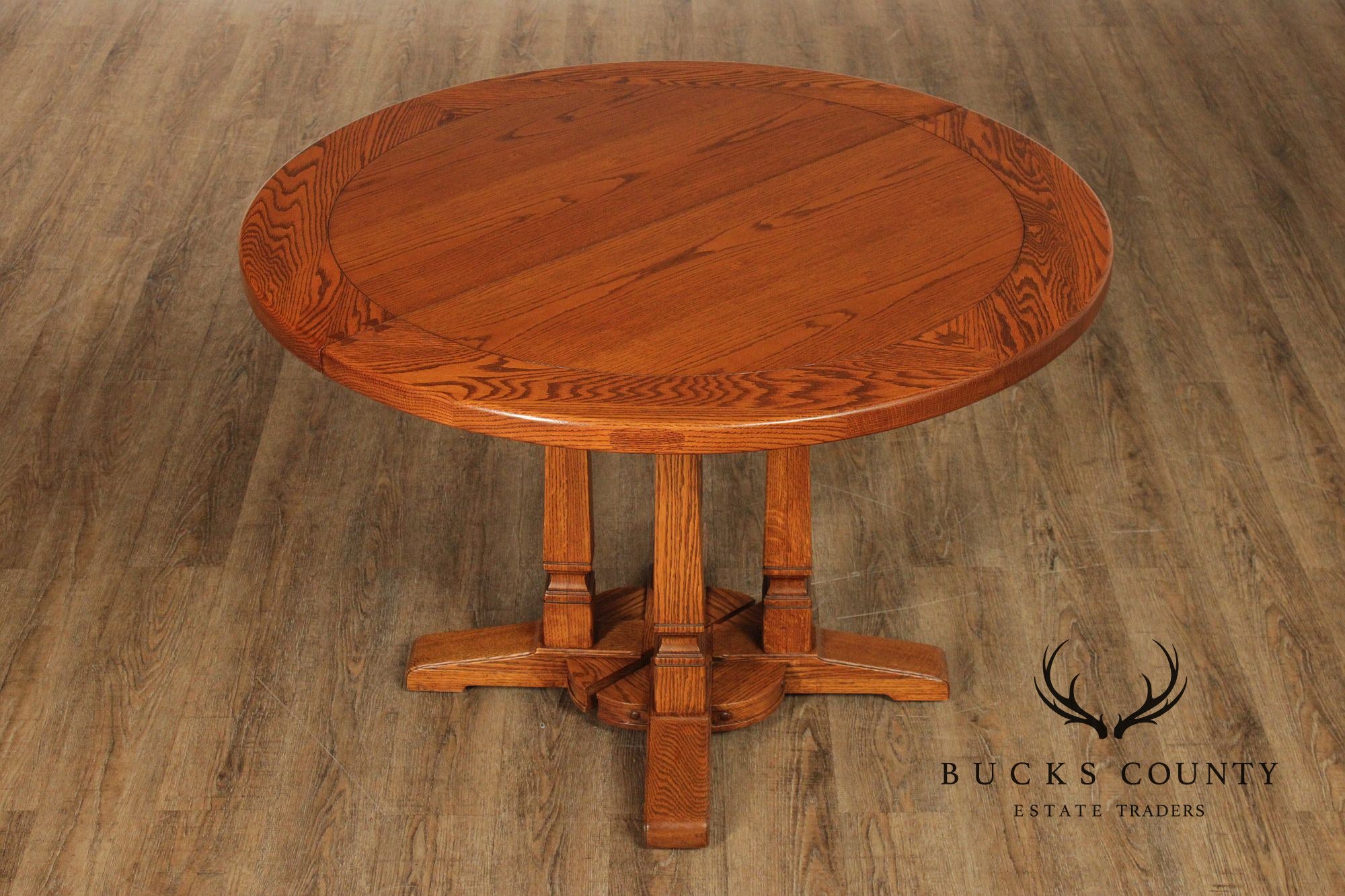Romweber Round Viking Oak Expandable Dining Table With Four Leaves