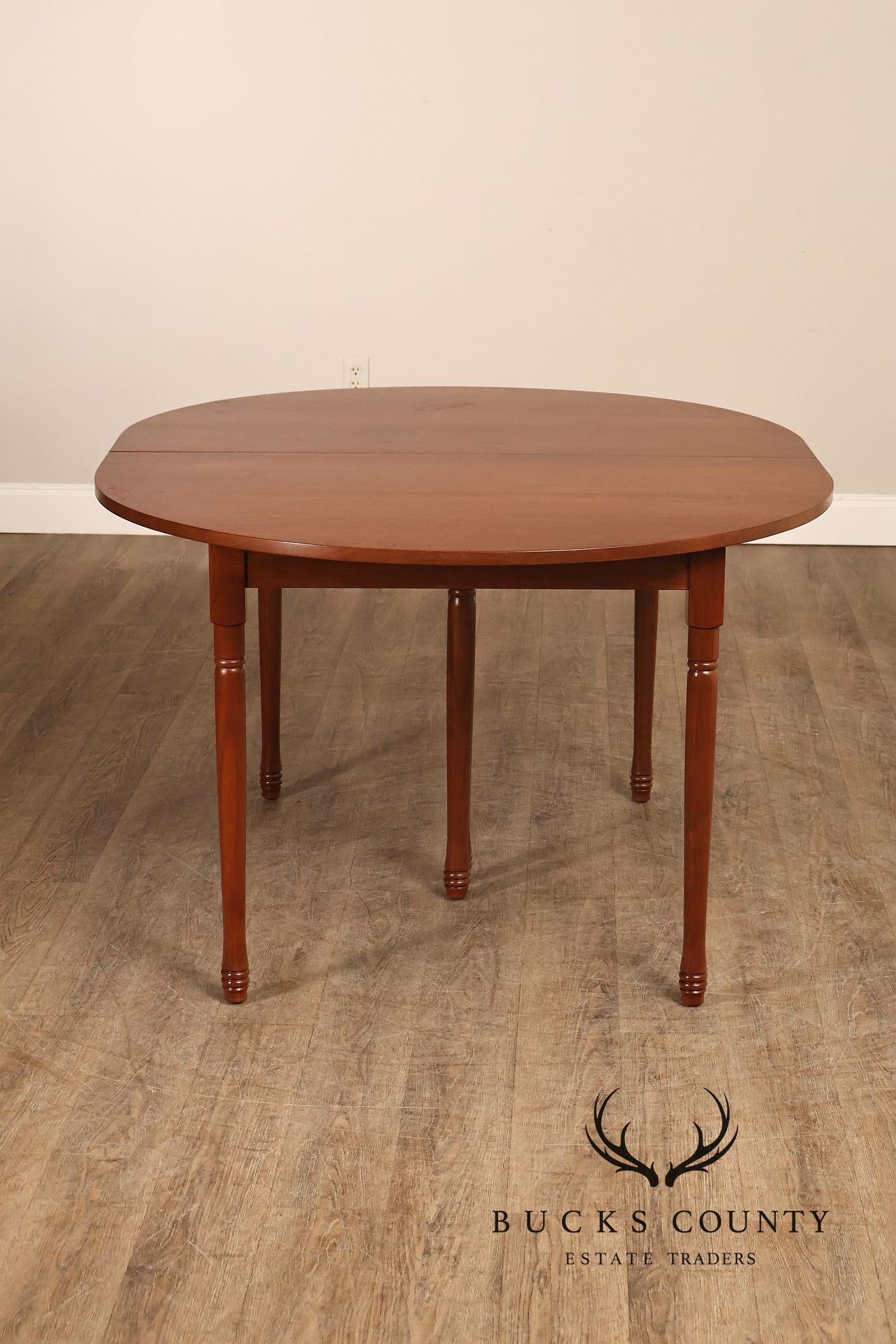 E. A. Clore Custom Walnut Extendable Dining Table With Four Leaves