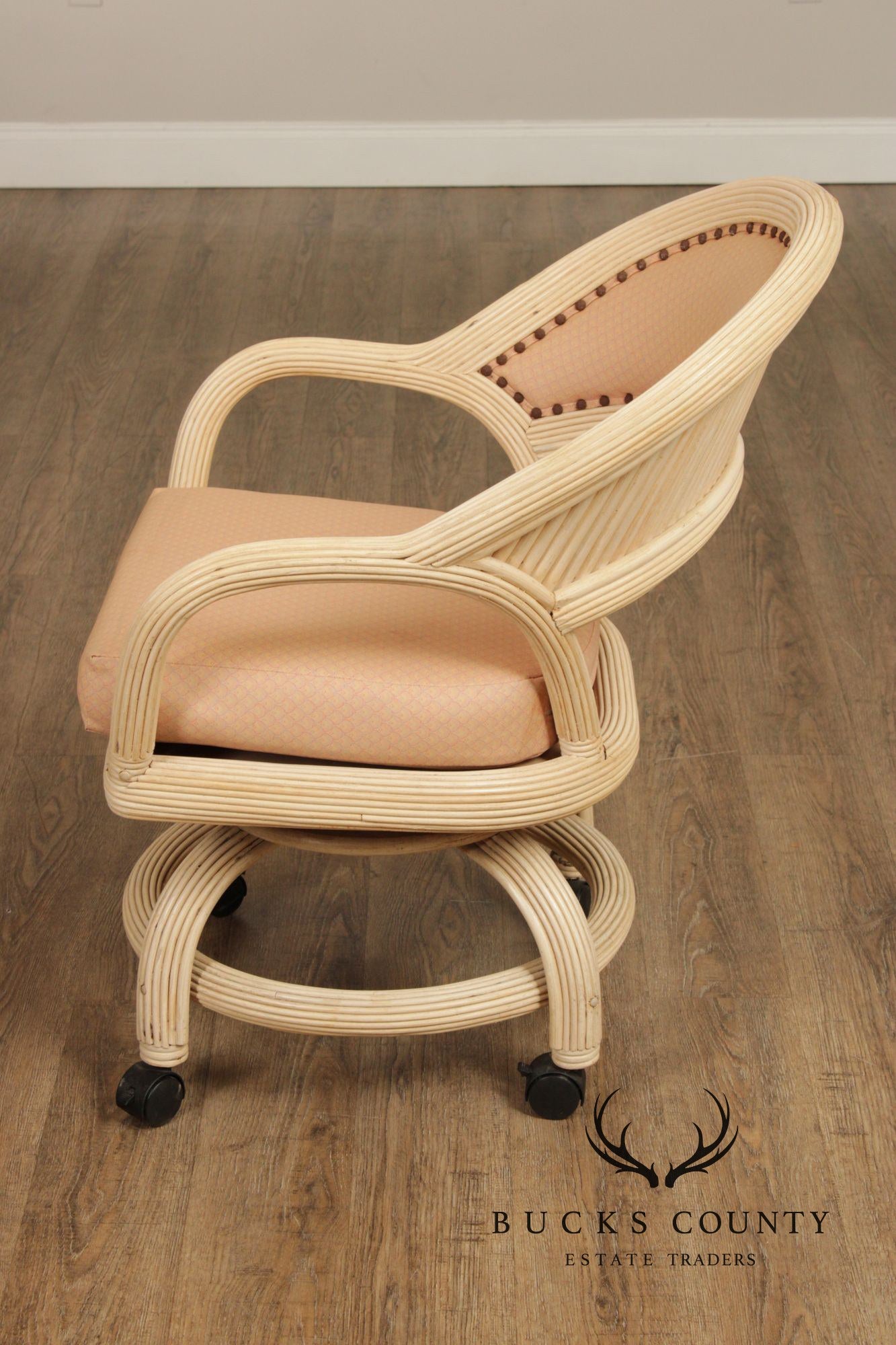 Set Of Four Mid-Century Rattan Swivel Rolling Dining Chairs With Upholstered Seats