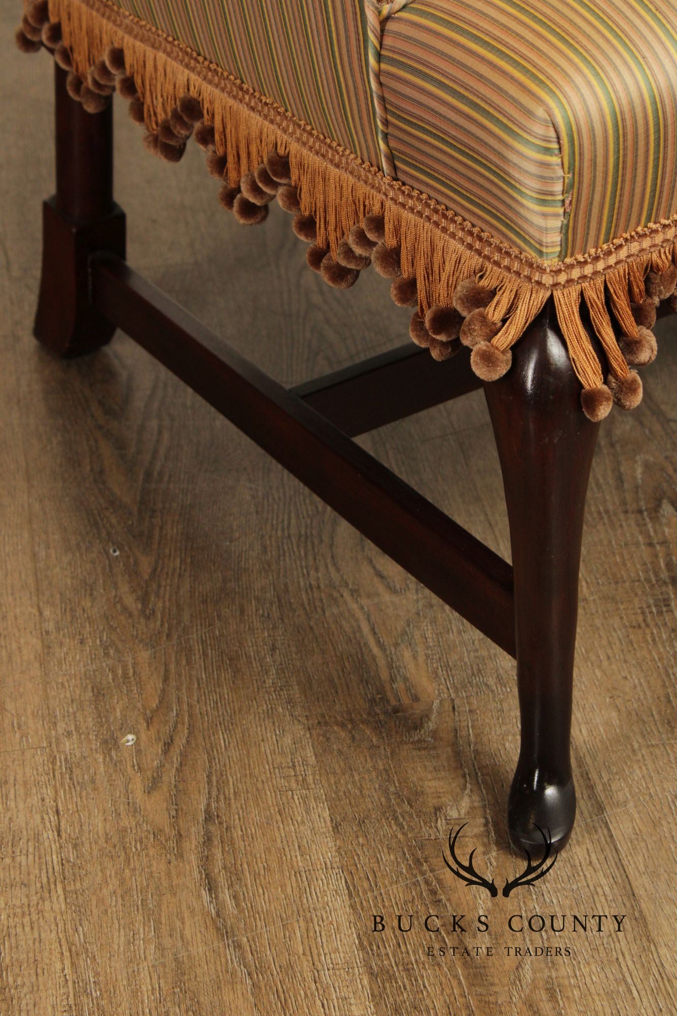 Queen Anne Style Upholstered Armchair With Striped Fabric And Fringe Skirt