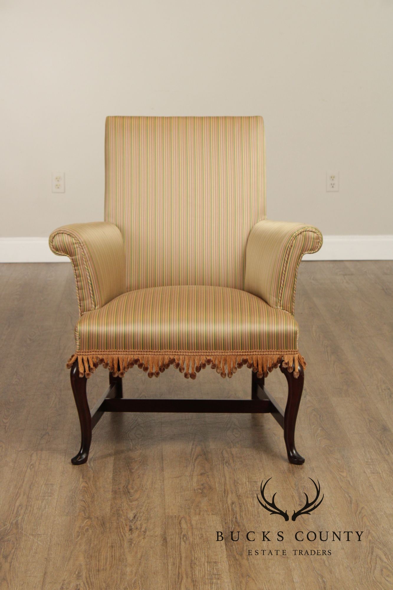 Queen Anne Style Upholstered Armchair With Striped Fabric And Fringe Skirt