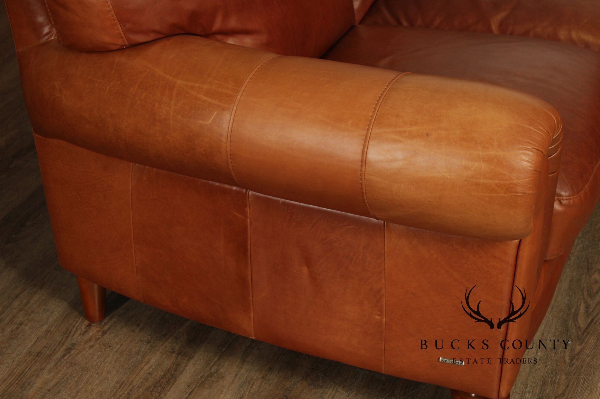 Natuzzi Brown Leather Three-PIece Sectional Sofa with Ottoman