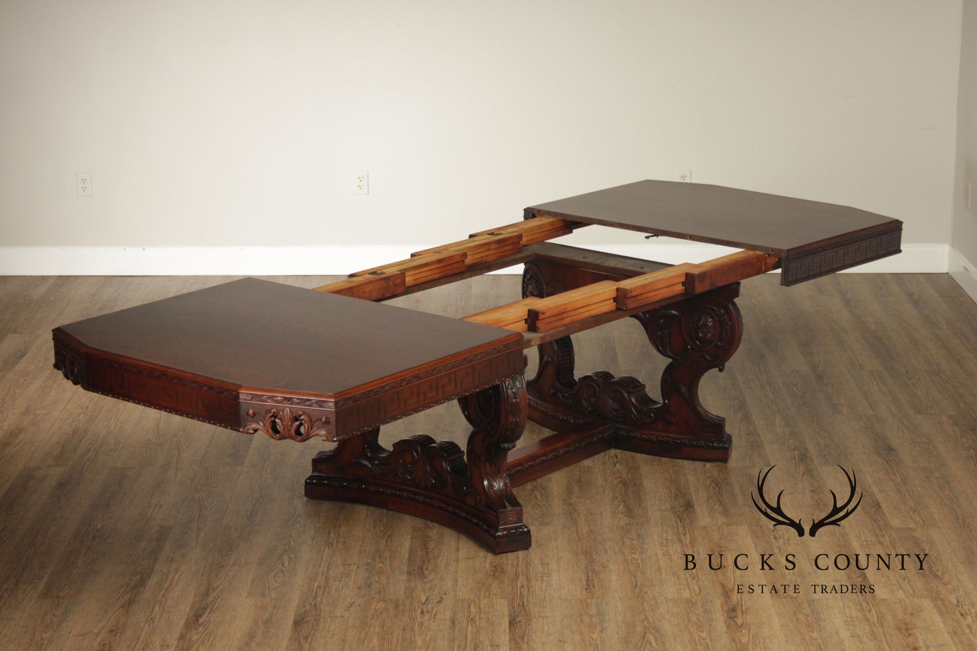 Exceptional Renaissance Revival Style Carved Mahogany Expandable Dining Table