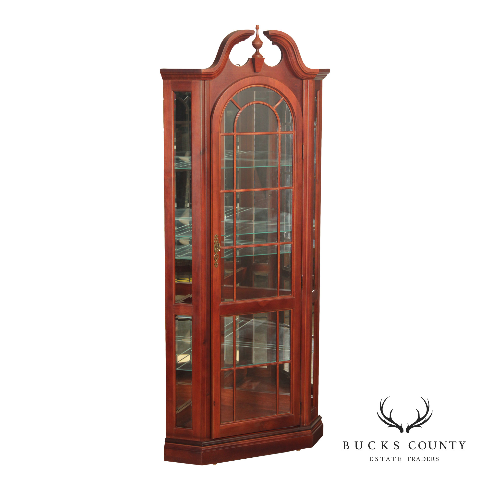 Pulaski Traditional Lighted Cherry Corner Curio Cabinet With Arched Pediment