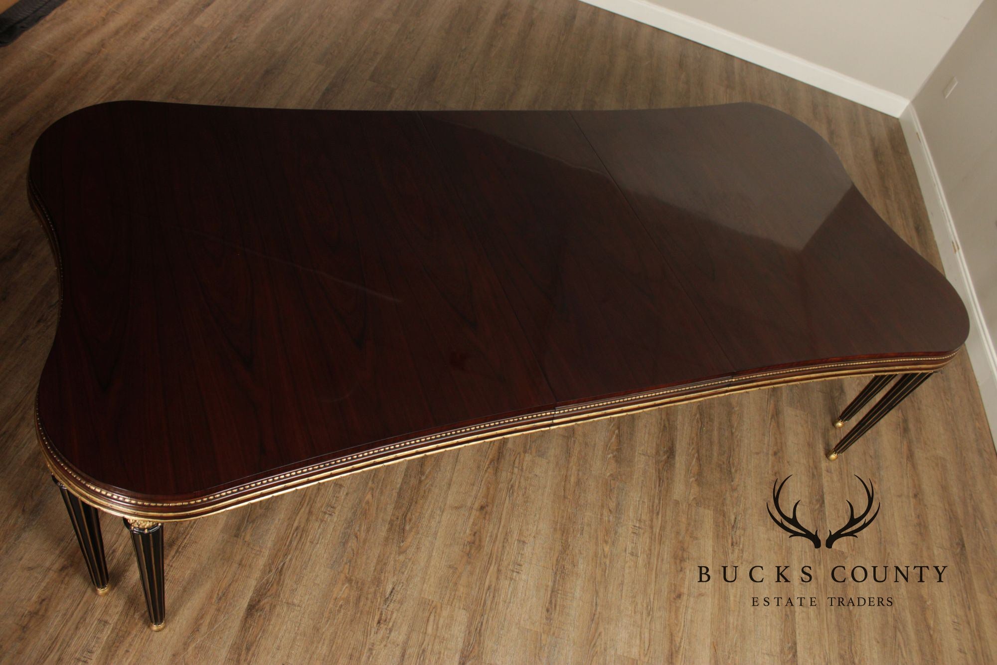 EJ Victor Mahogany And Gilt Dining Table With One Leaf