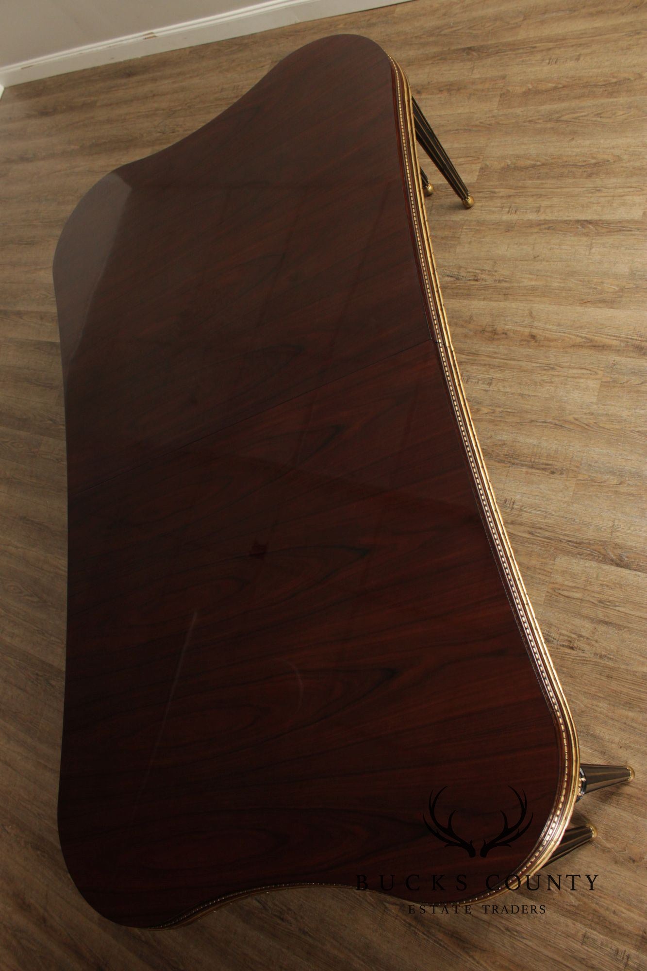 EJ Victor Mahogany And Gilt Dining Table With One Leaf