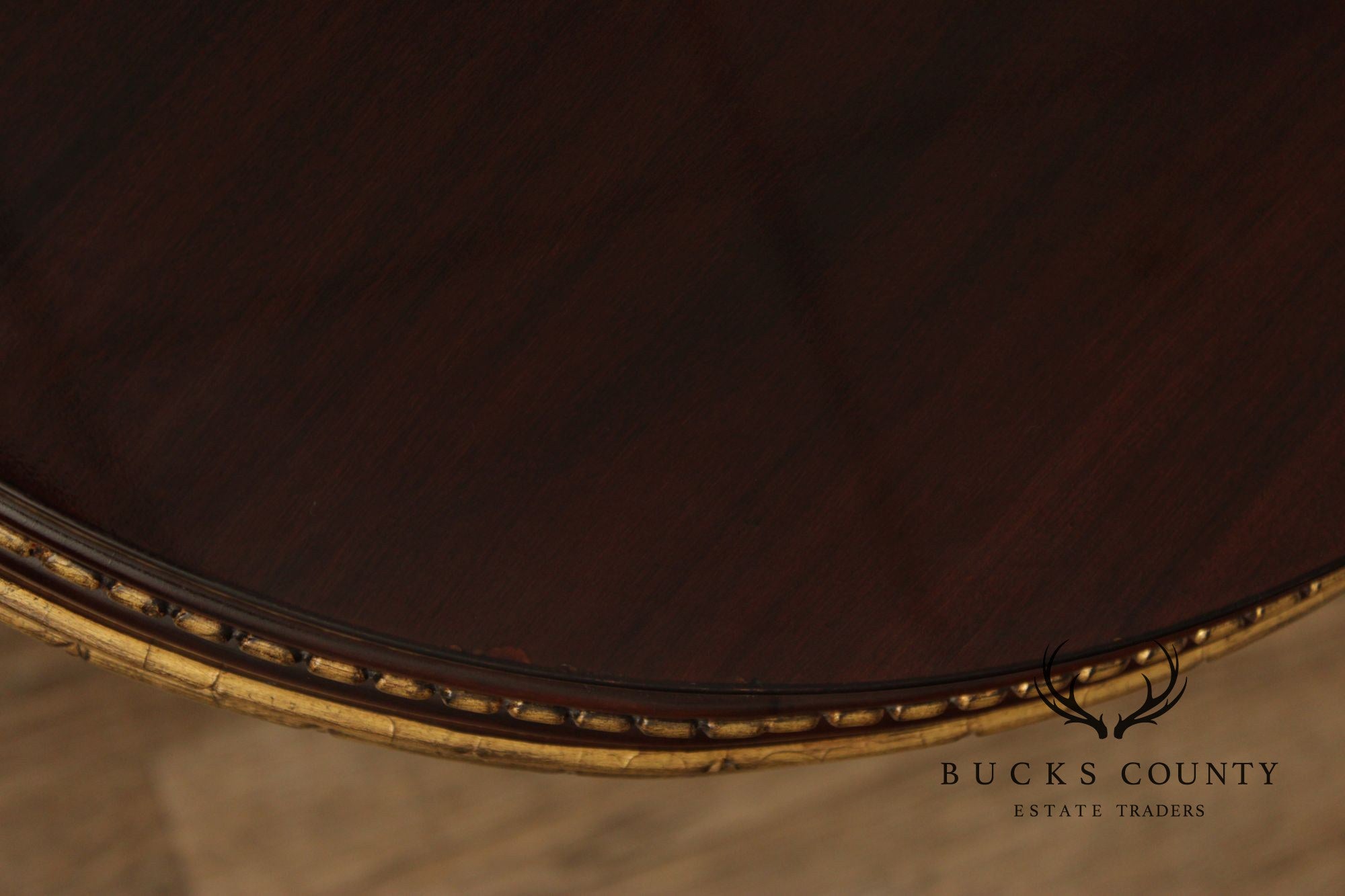 EJ Victor Mahogany And Gilt Dining Table With One Leaf