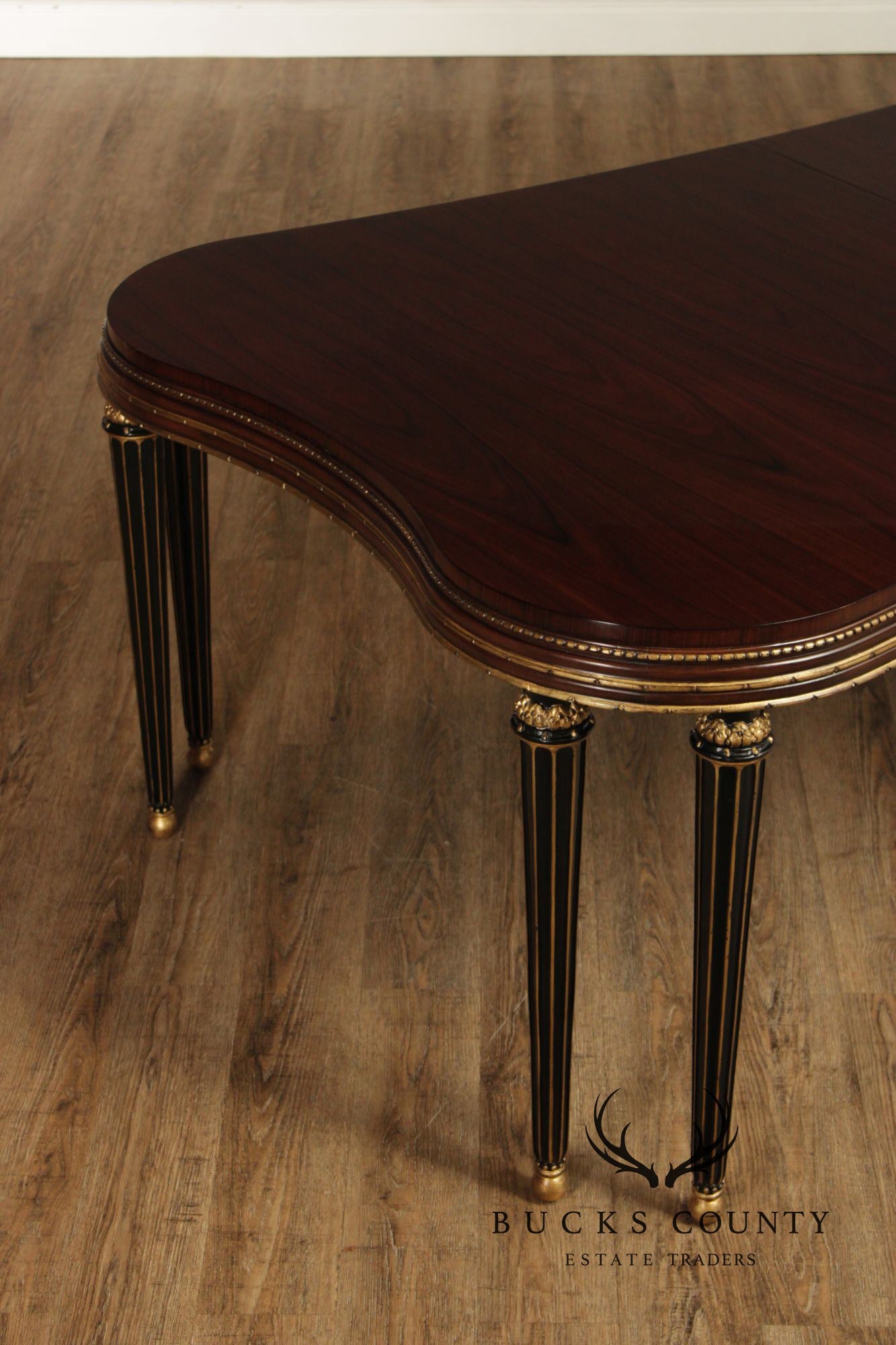 EJ Victor Mahogany And Gilt Dining Table With One Leaf