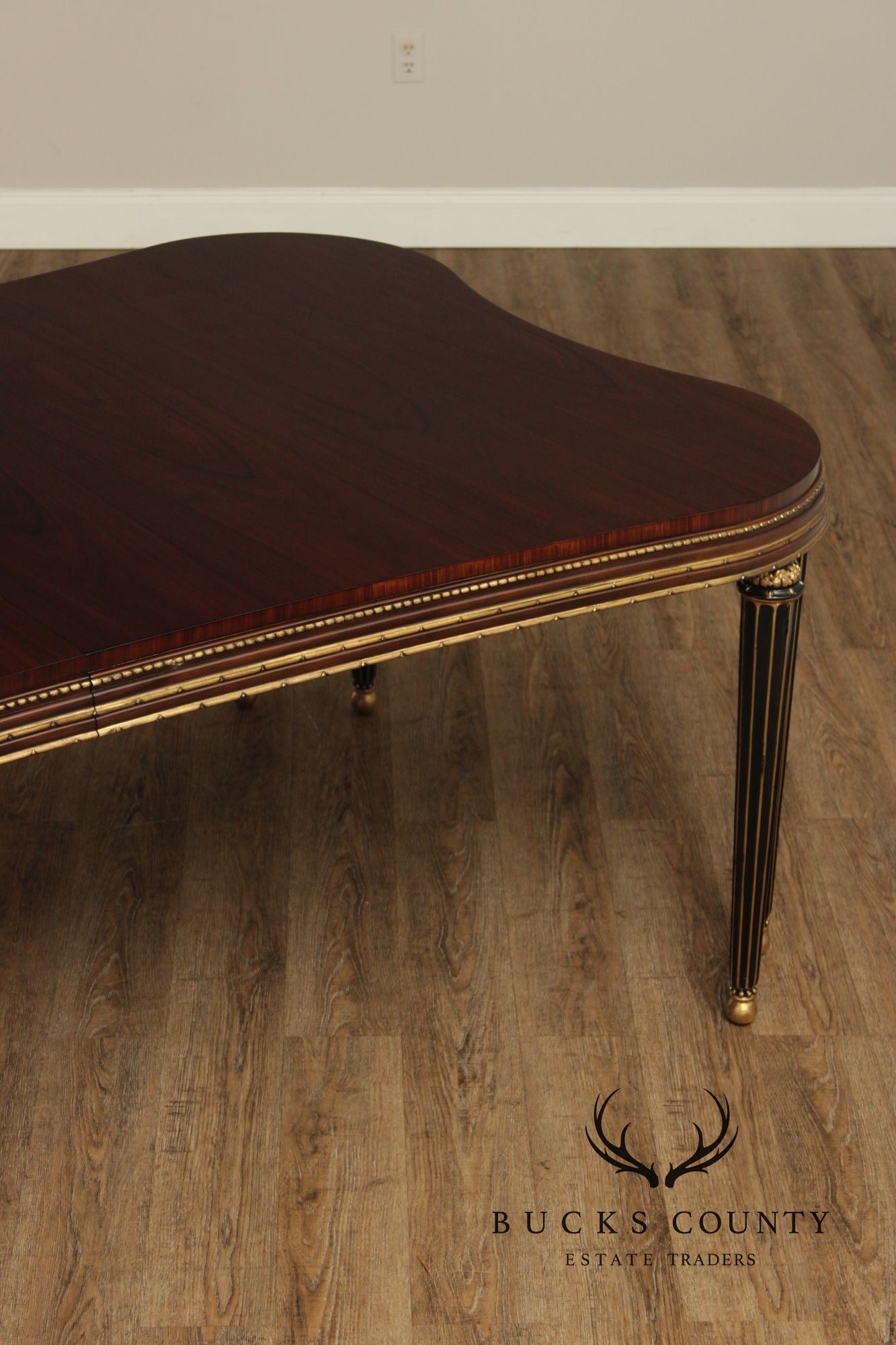 EJ Victor Mahogany And Gilt Dining Table With One Leaf
