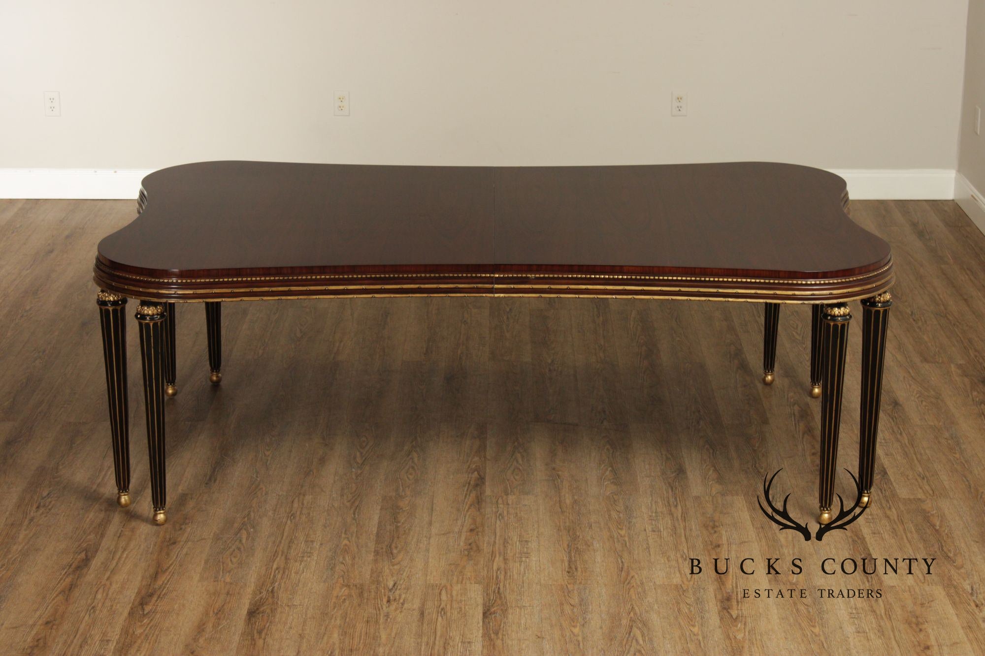 EJ Victor Mahogany And Gilt Dining Table With One Leaf