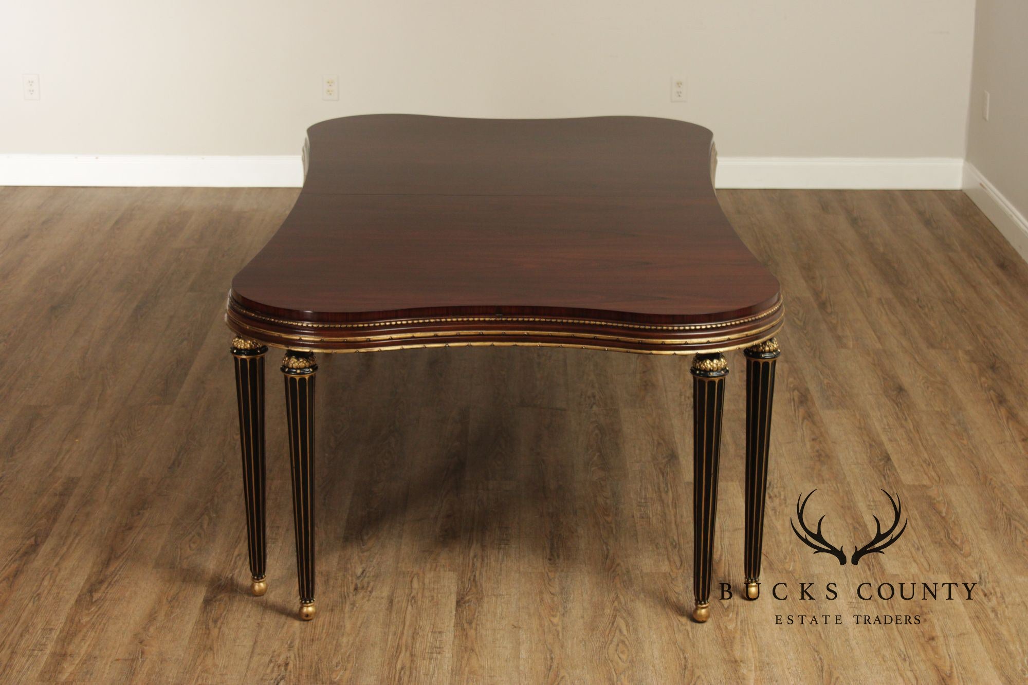 EJ Victor Mahogany And Gilt Dining Table With One Leaf