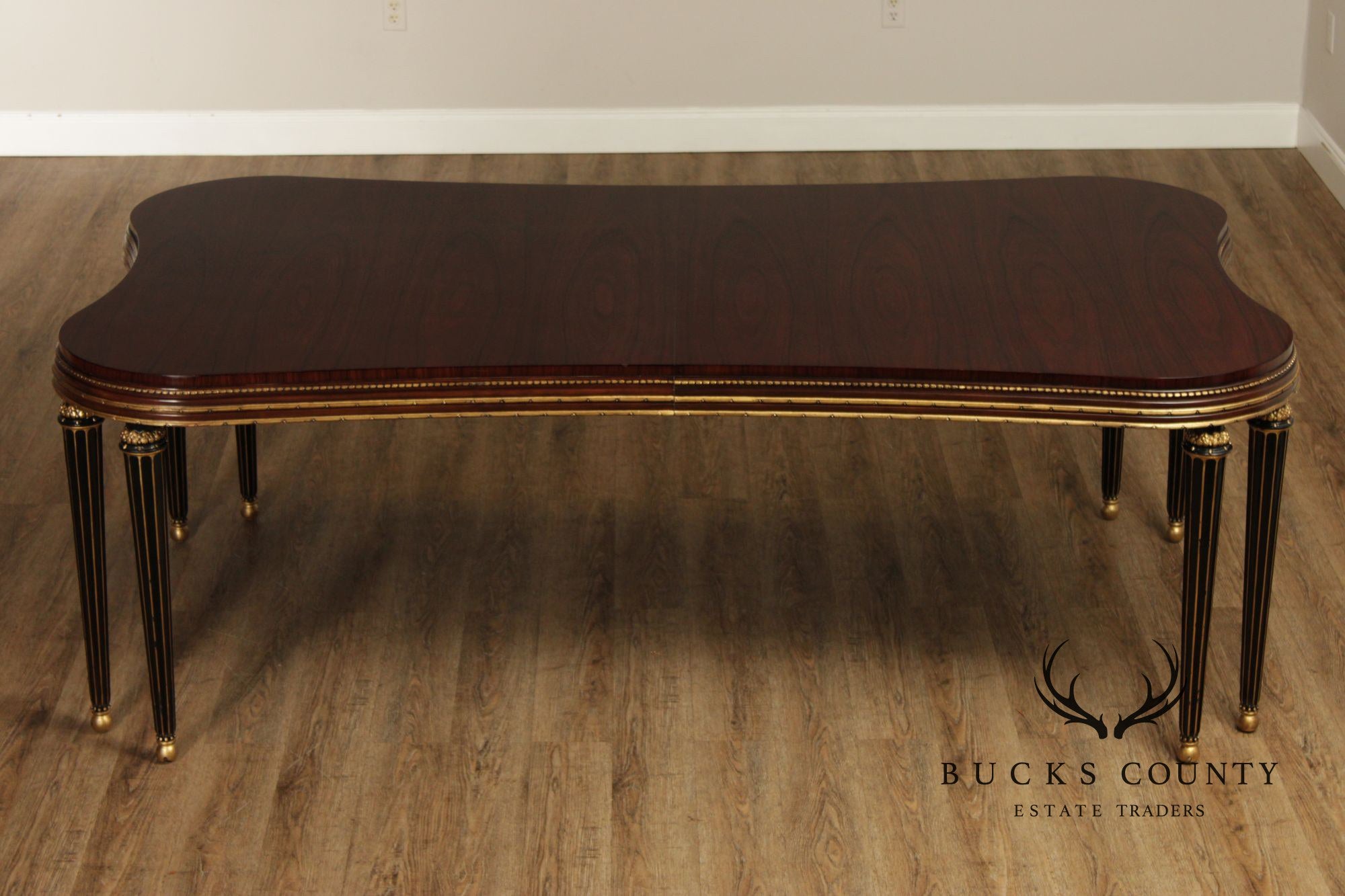 EJ Victor Mahogany And Gilt Dining Table With One Leaf