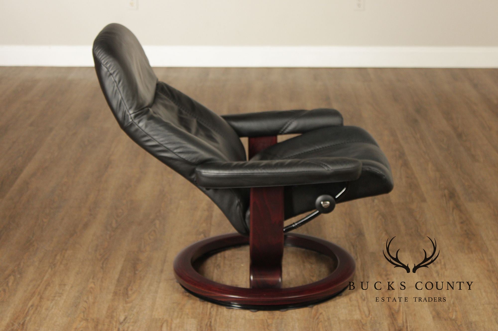 Ekornes Stressless Black Leather Recliner With Ottoman