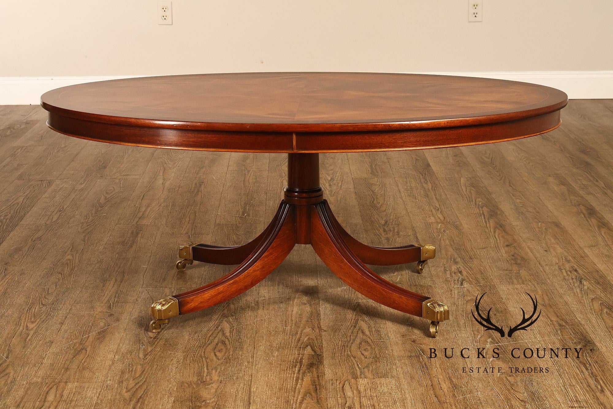 Regency Style Flame Mahogany Oval Top Coffee Table