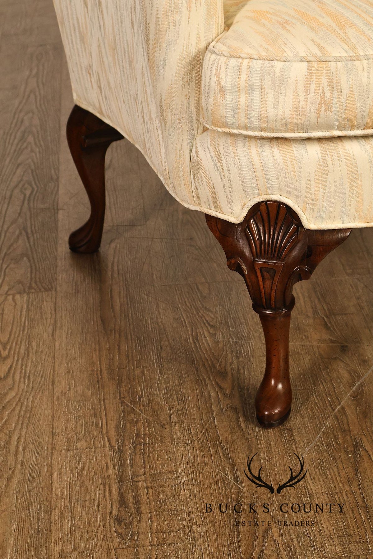 Traditional Upholstered Pair Of Wingback Armchairs With Carved Cabriole Legs