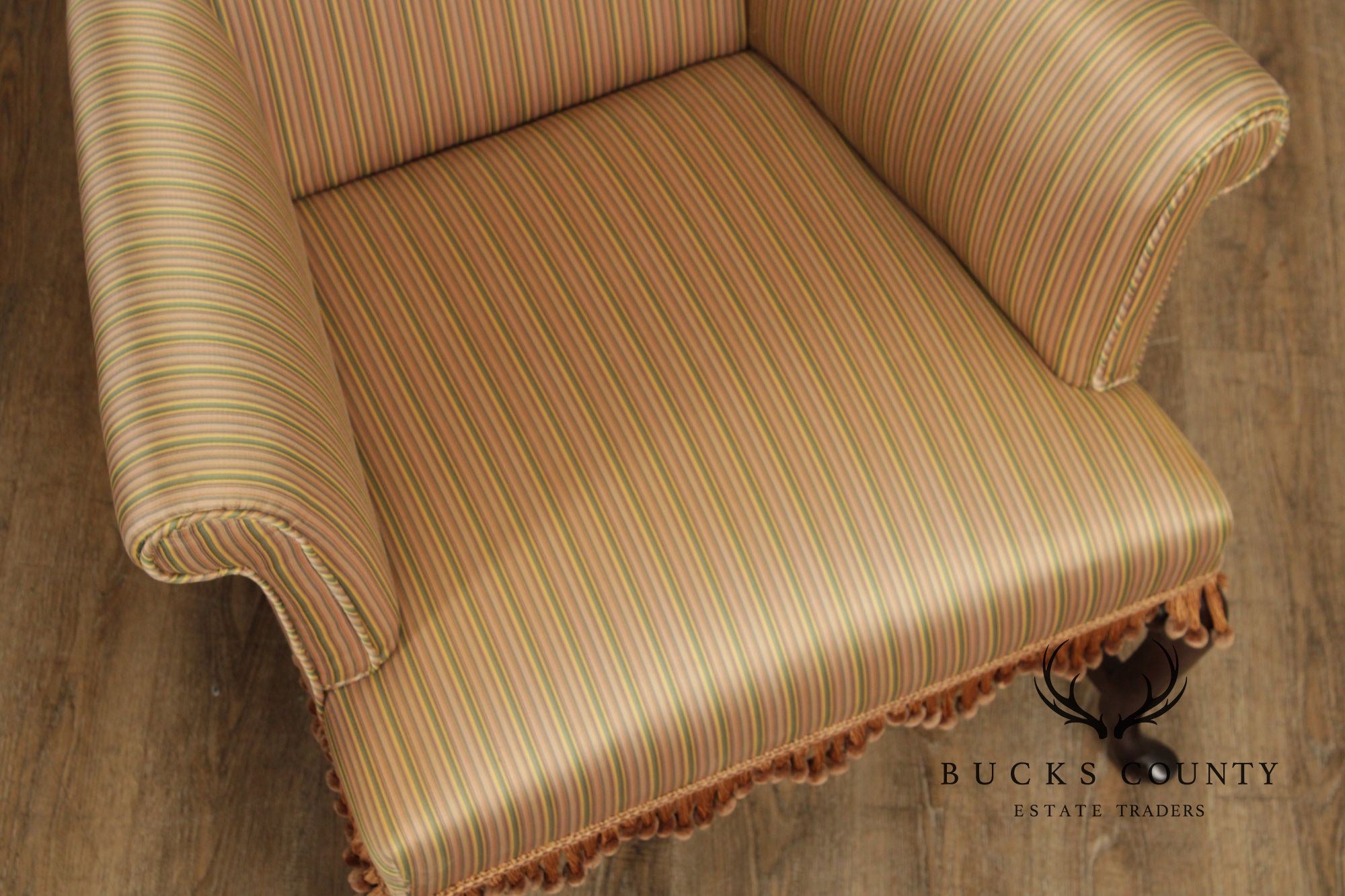 Queen Anne Style Upholstered Armchair With Striped Fabric And Fringe Skirt