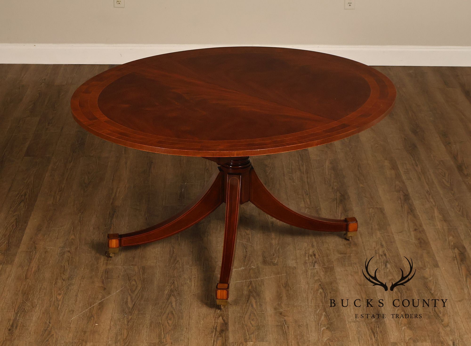 Baker Regency Style Banded Mahogany Extendable Dining Table