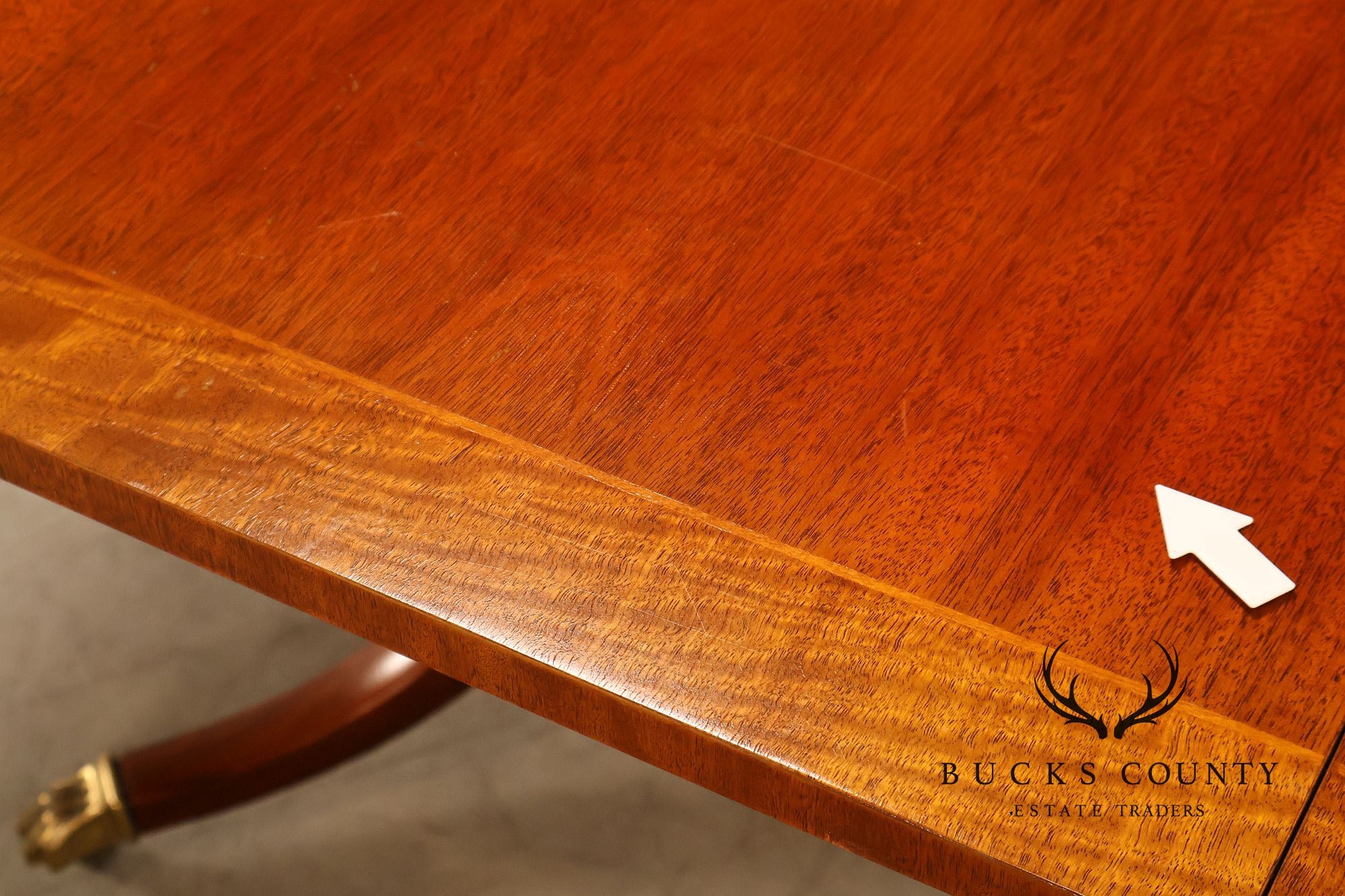 Baker Furniture Company Regency Style Mahogany Double Pedestal Dining Table With Satinwood Banding And Extension Leaves