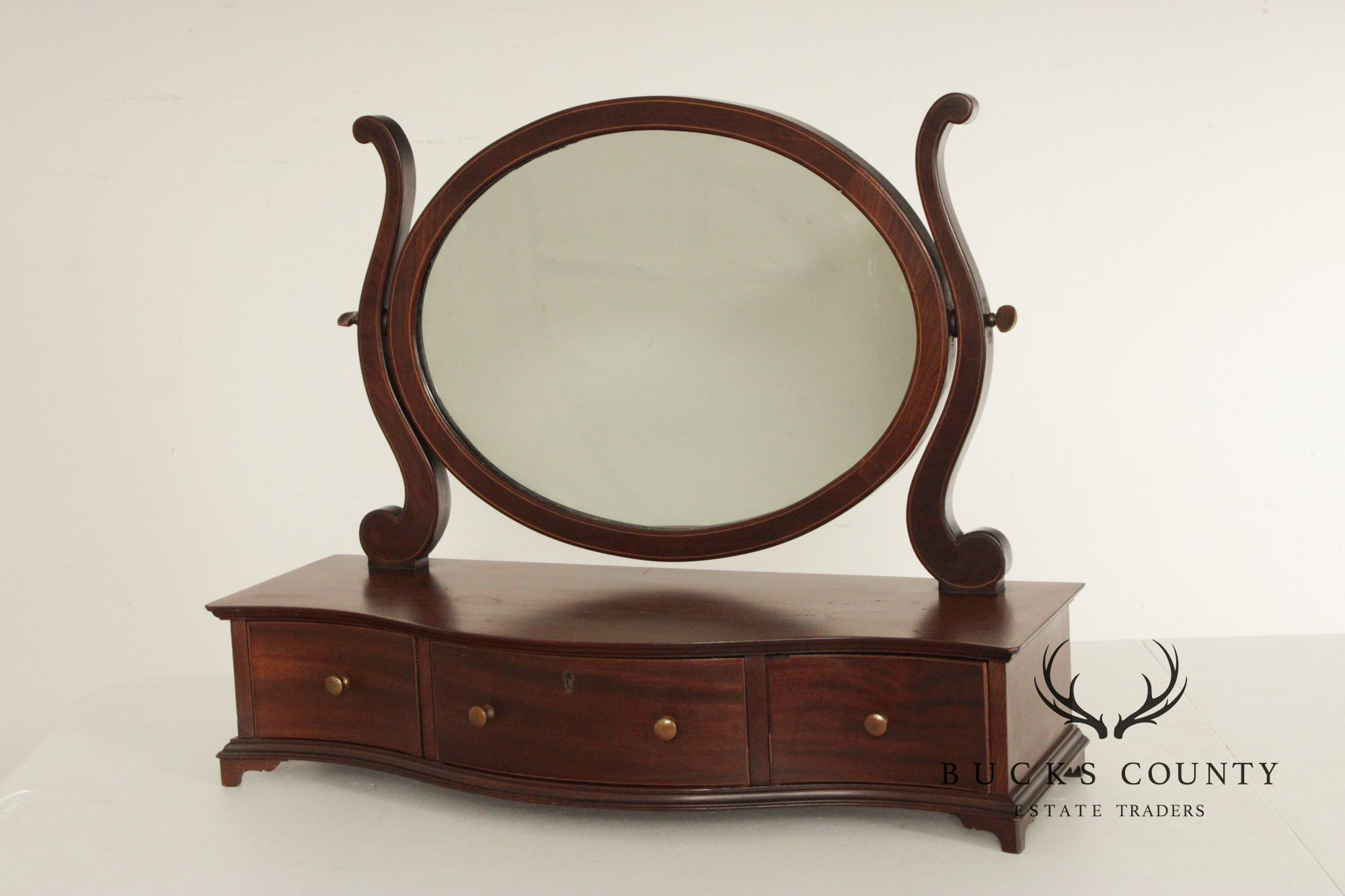 Potthast Bros. Federal Style Mahogany Shaving Mirror With Serpentine Base And Oval Swivel Glass