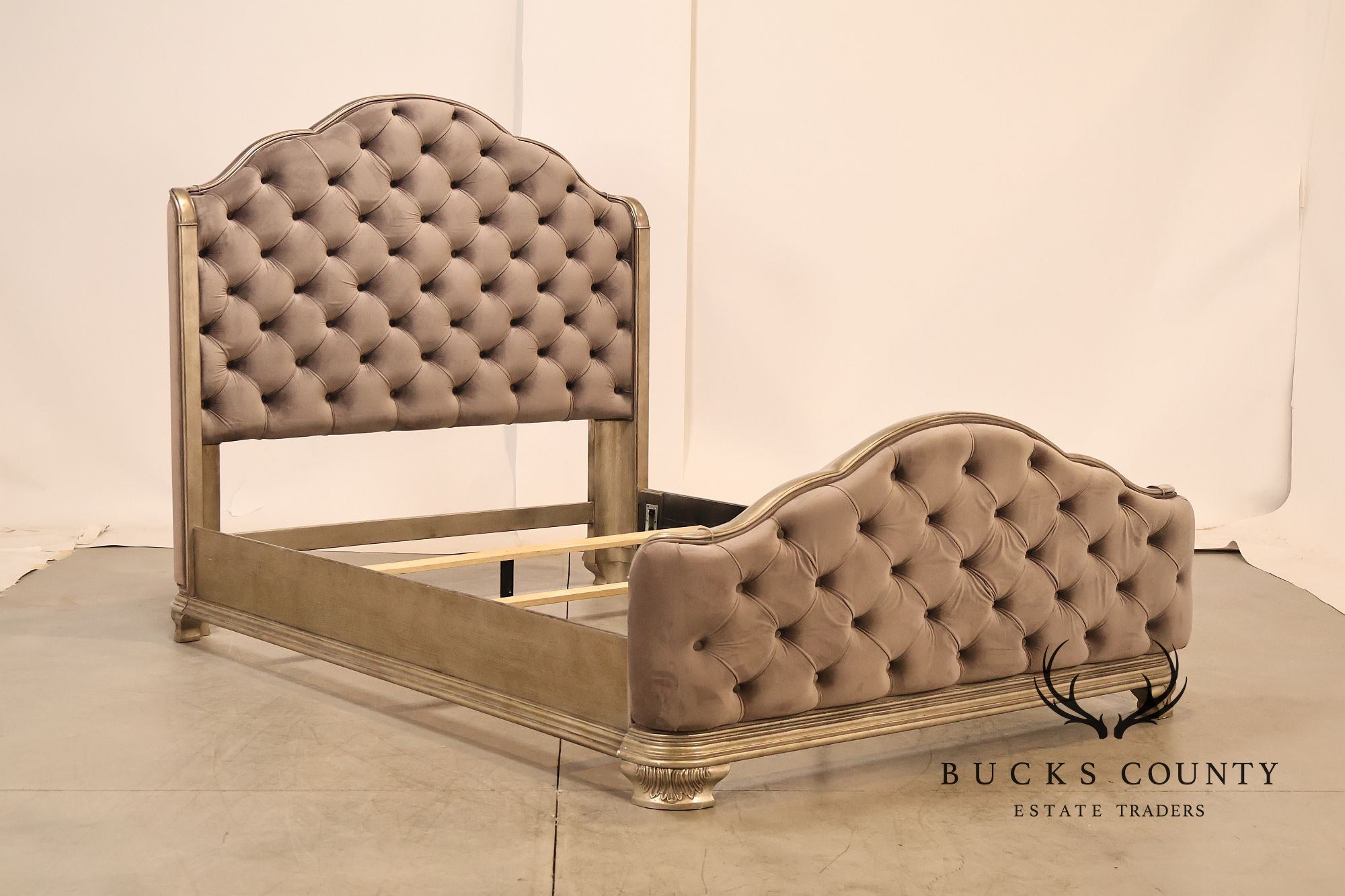 Elegant Queen Bed Featuring a Deep Tufted Upholstered Head and Footboard