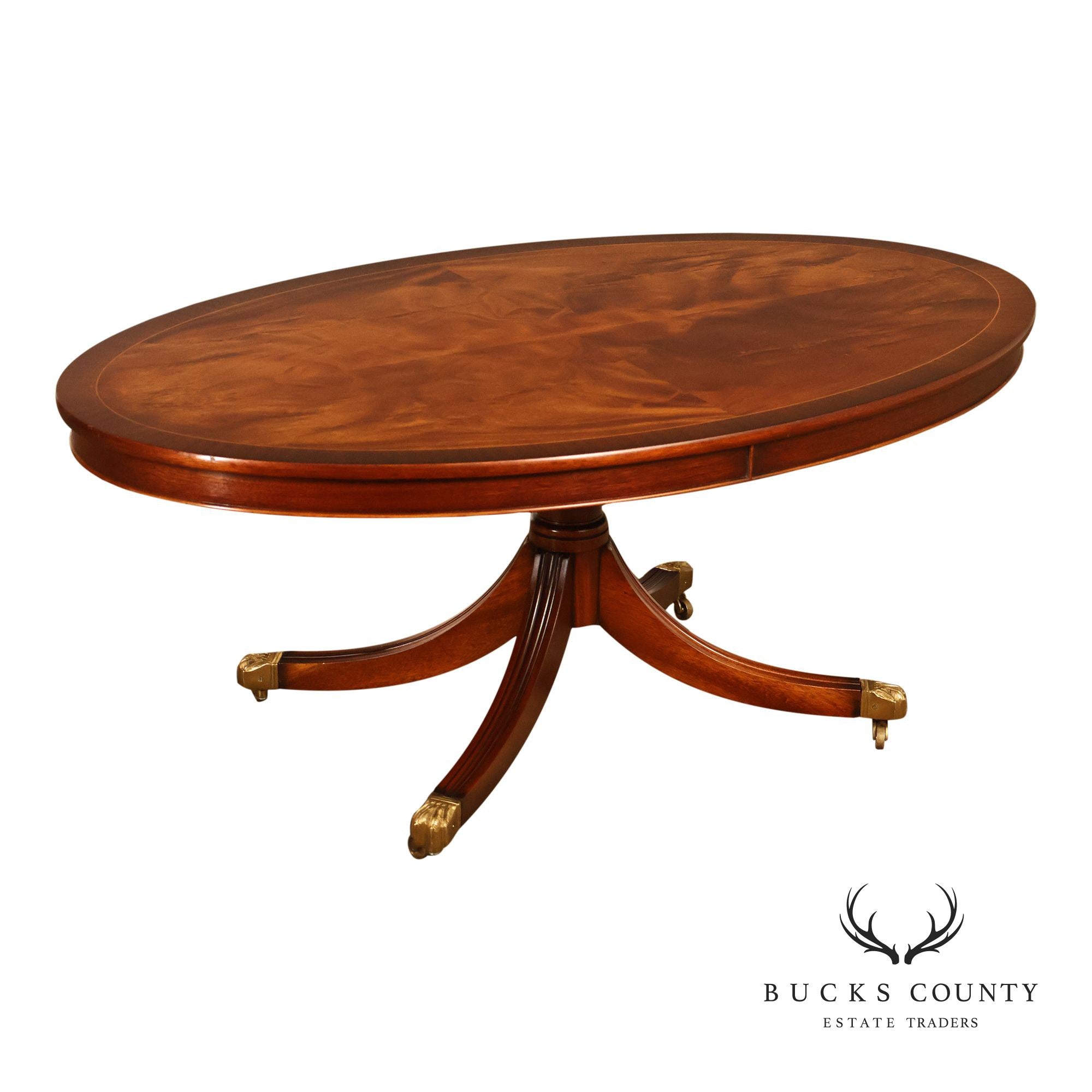 Regency Style Flame Mahogany Oval Top Coffee Table