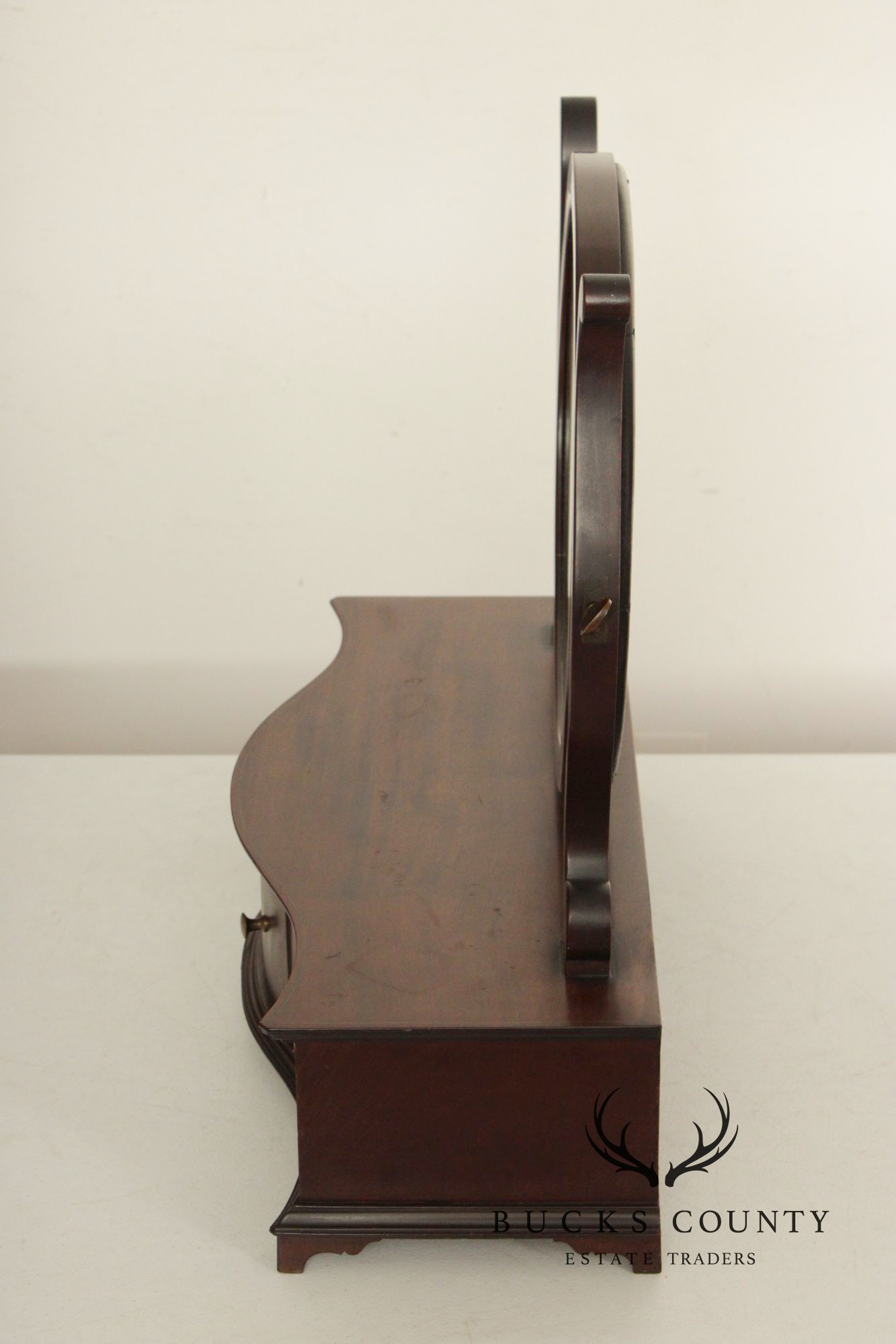 Potthast Bros. Federal Style Mahogany Shaving Mirror With Serpentine Base And Oval Swivel Glass