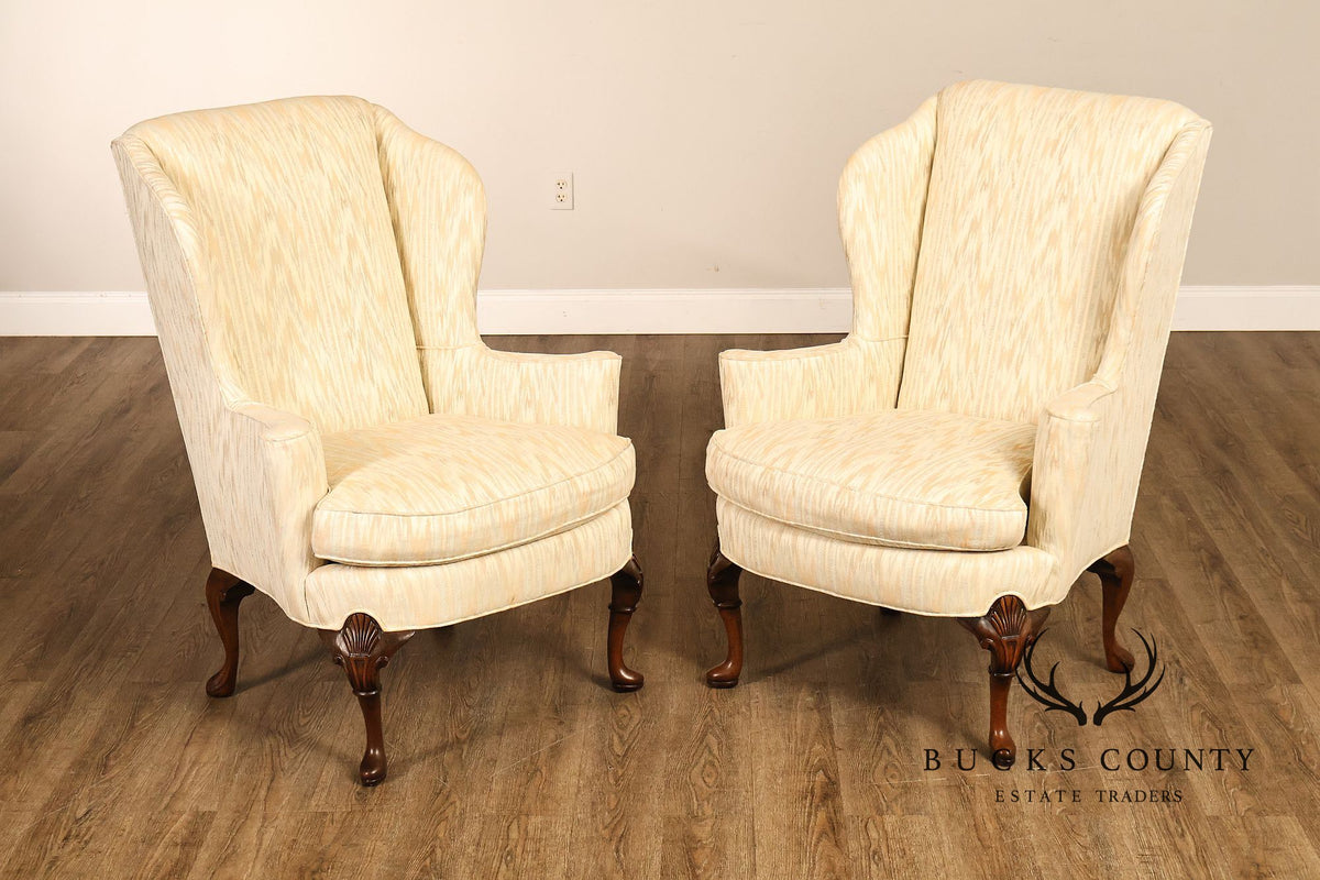 Traditional Upholstered Pair Of Wingback Armchairs With Carved Cabriole Legs