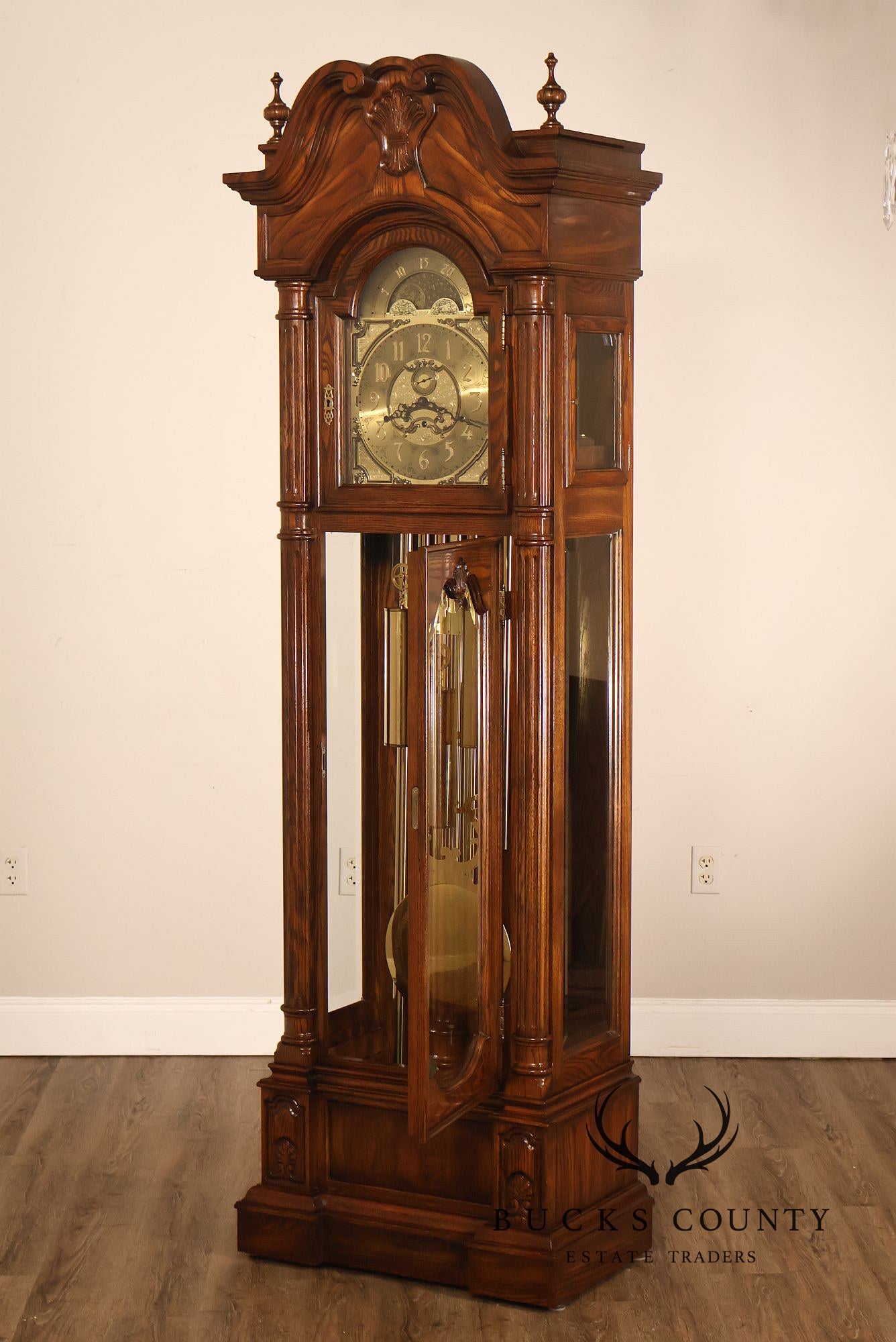 Sligh Traditional Oak Triple Chime Grandfather Clock With Moon Phase Dial