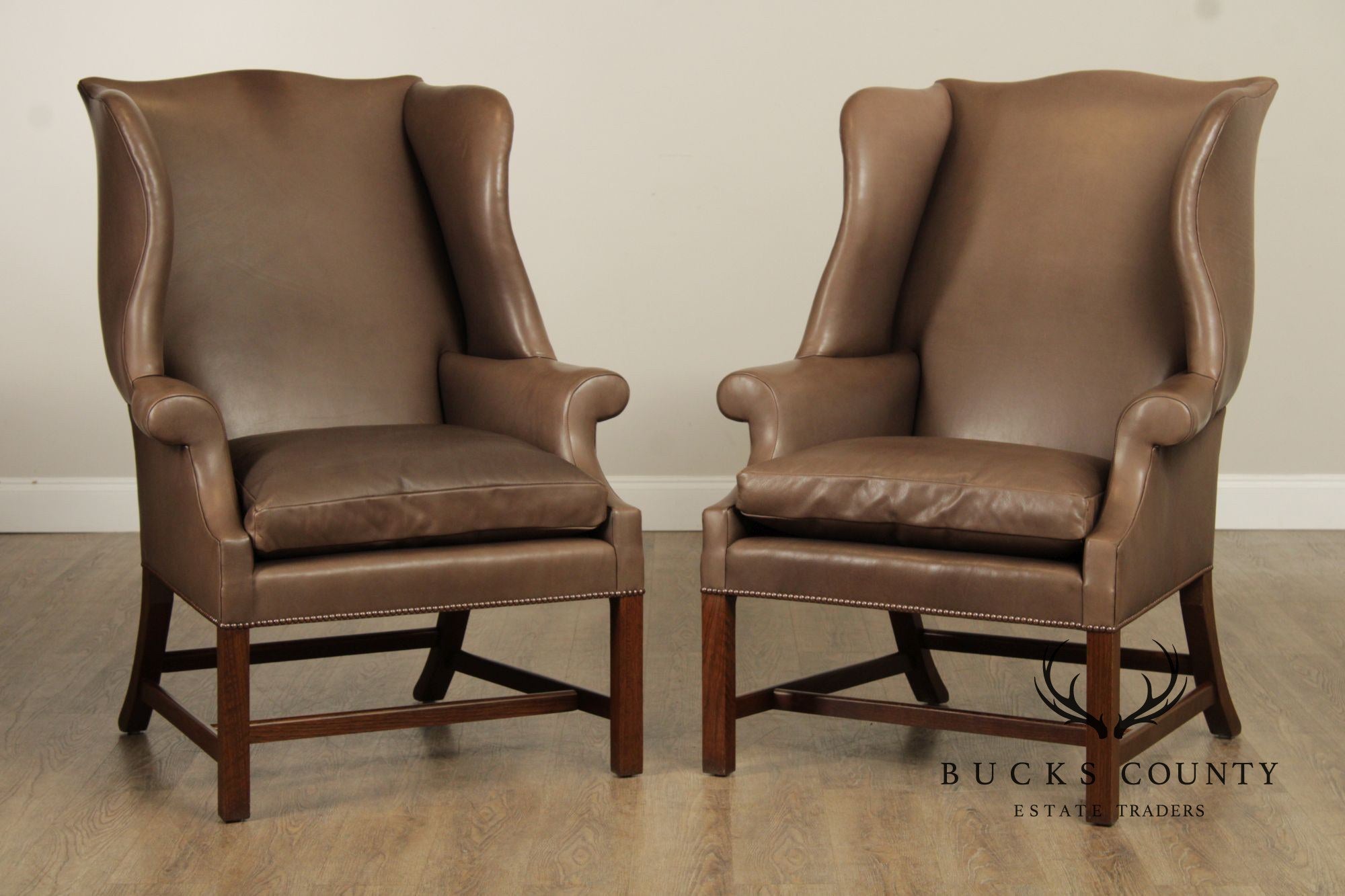 Chippendale Style Pair of Leather Wing Chairs