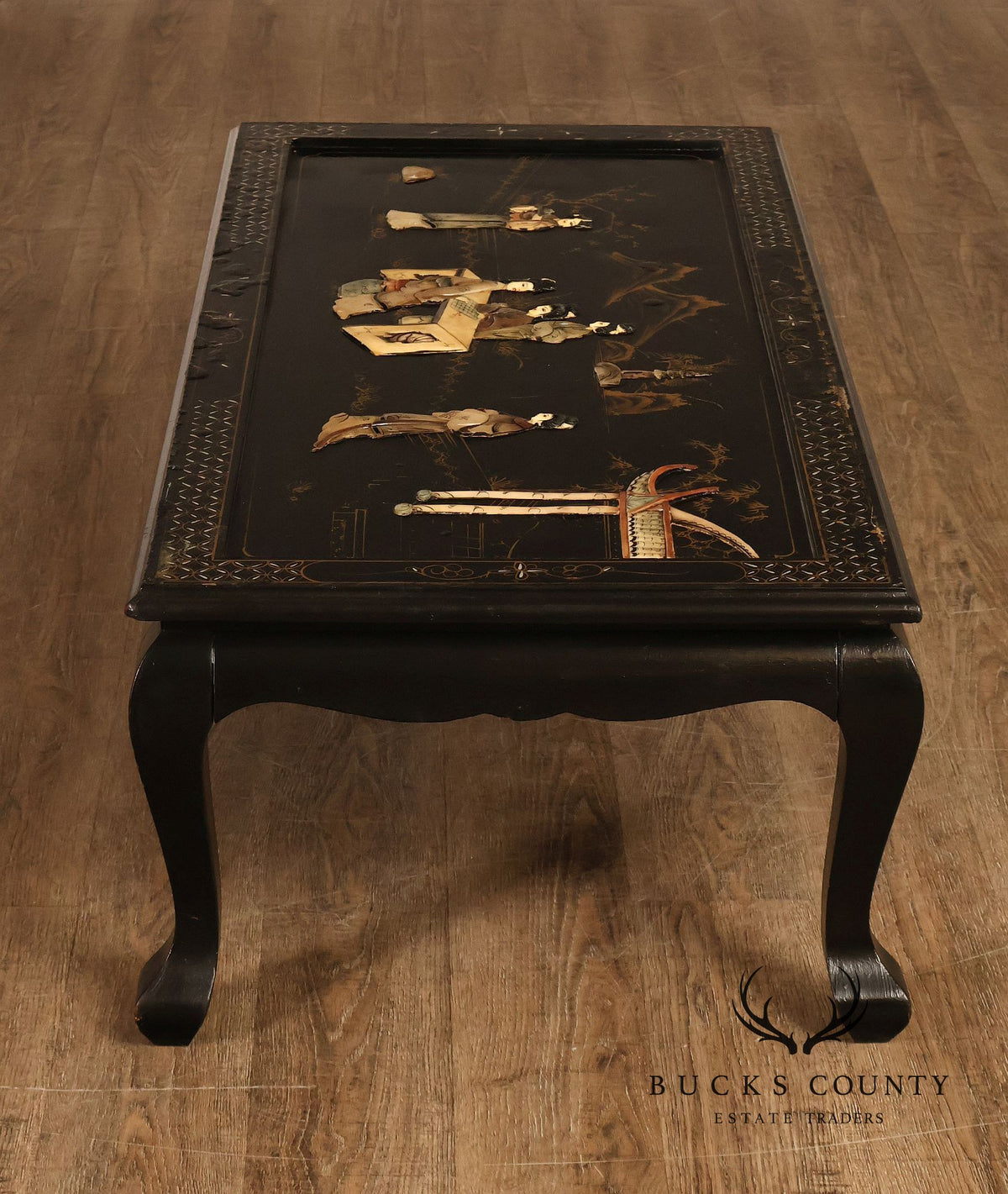 Asian Inspired Black Lacquer Coffee Table With Figural Inlay