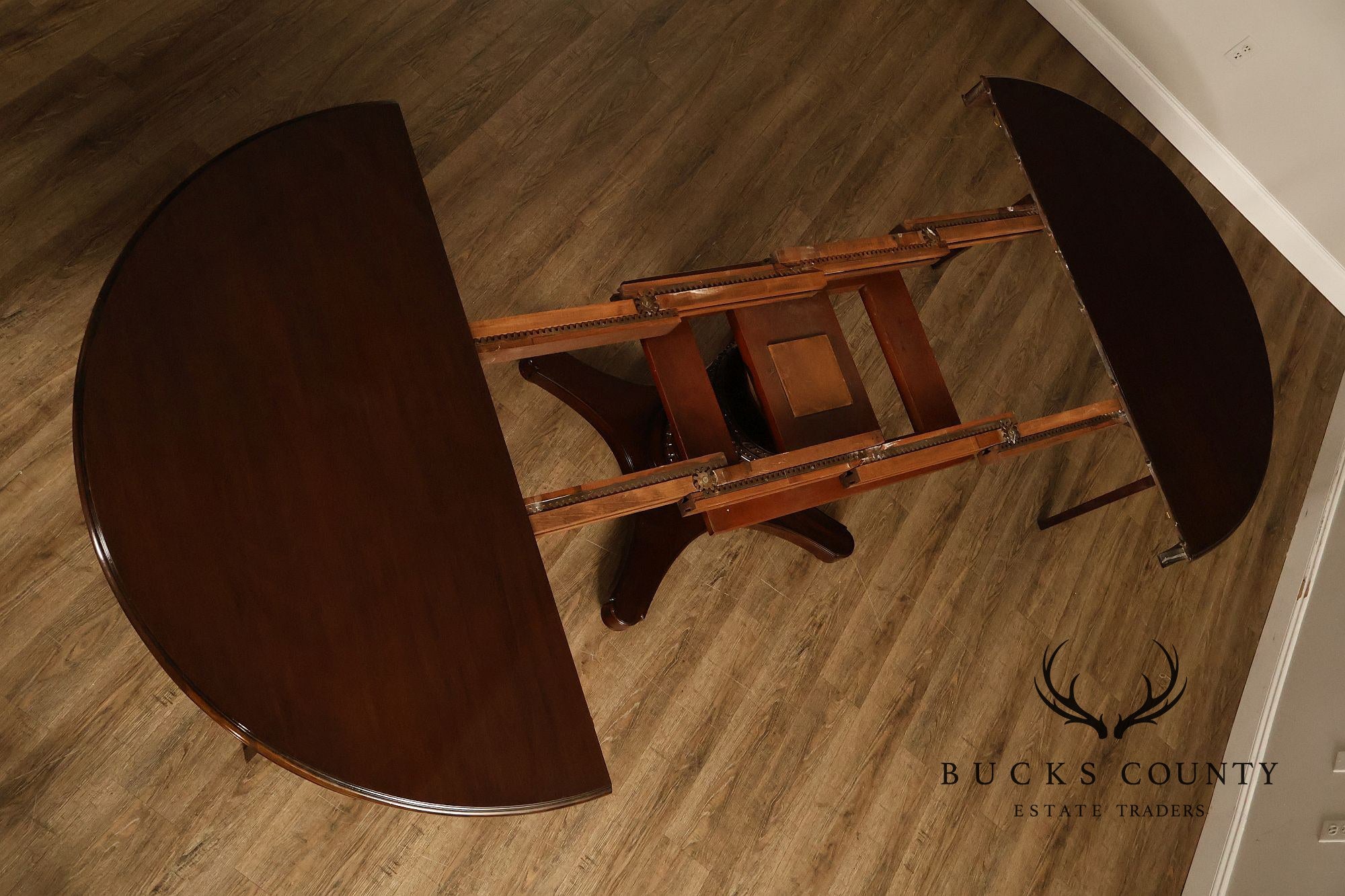 Empire Style 54" Round Mahogany Expandable Pedestal Dining Table