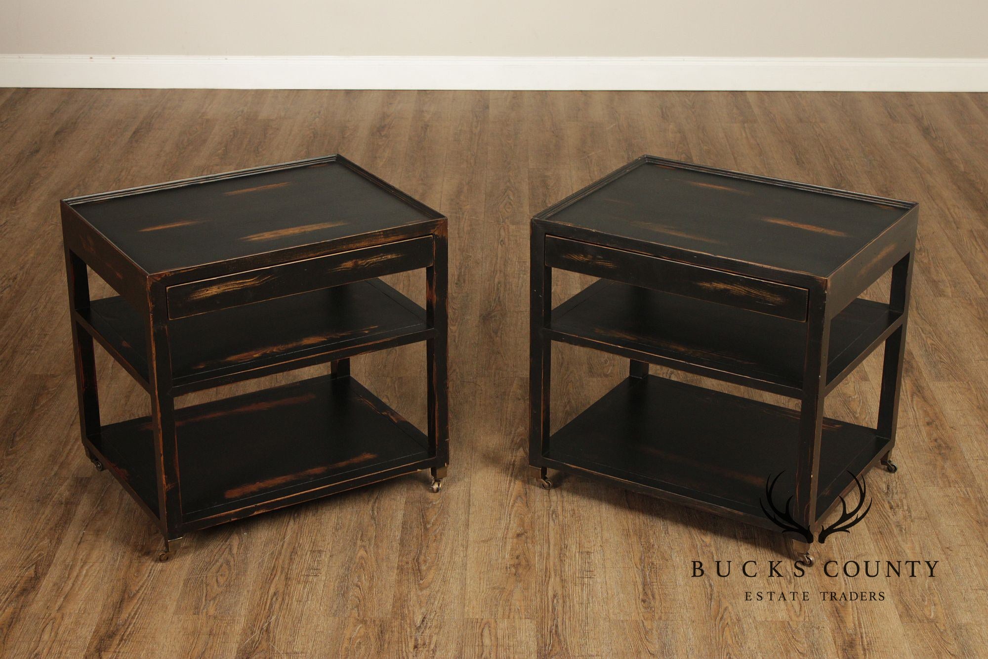 Industrial Style Pair of Ebonized Rolling End Tables