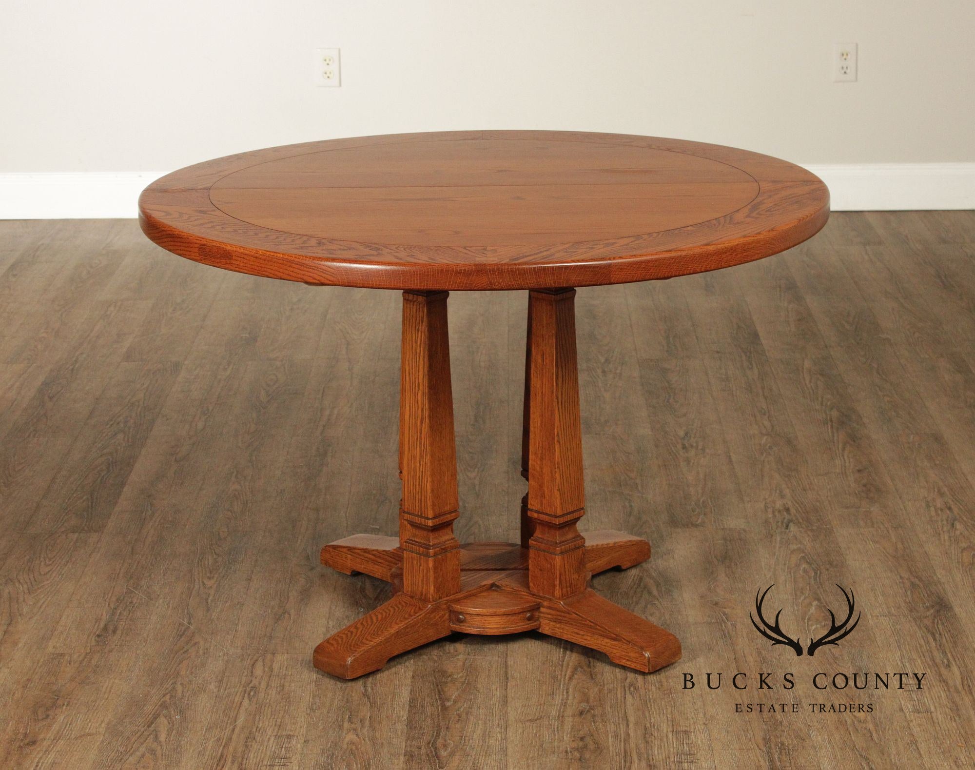 Romweber Round Viking Oak Expandable Dining Table With Four Leaves
