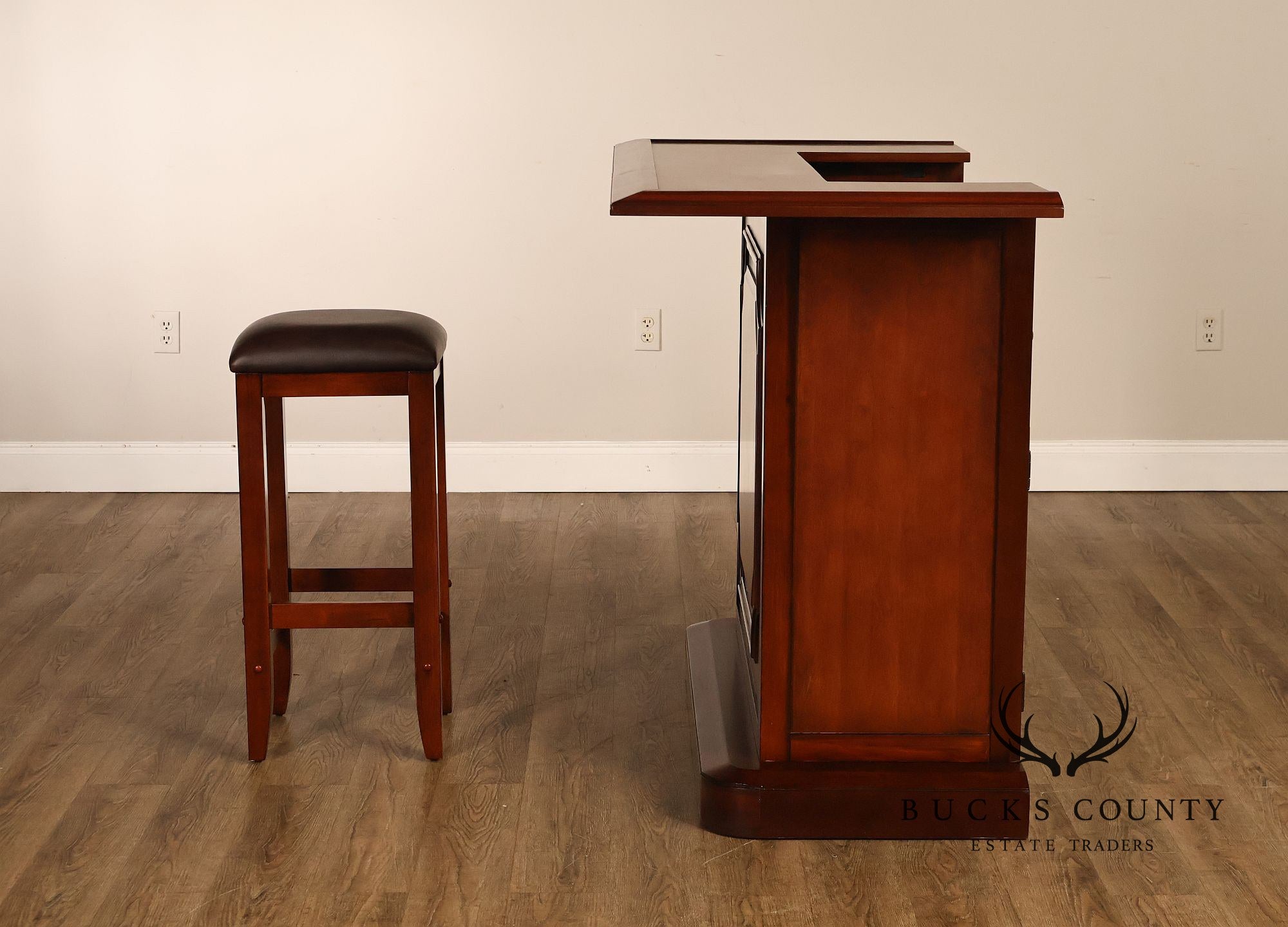 Traditional Home Bar With Wine Storage And Two Bar Stools