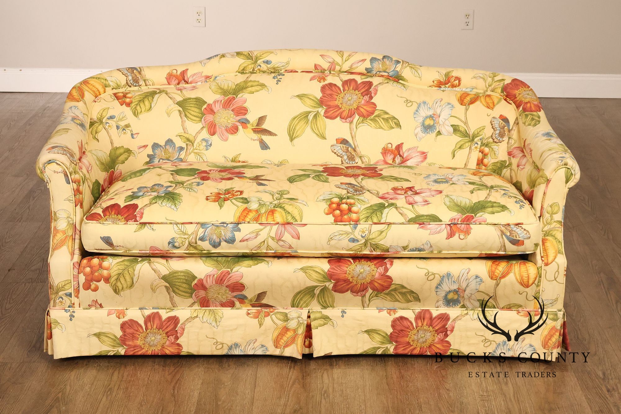 Custom Upholstered Pair Of Floral Chintz Skirted Loveseats